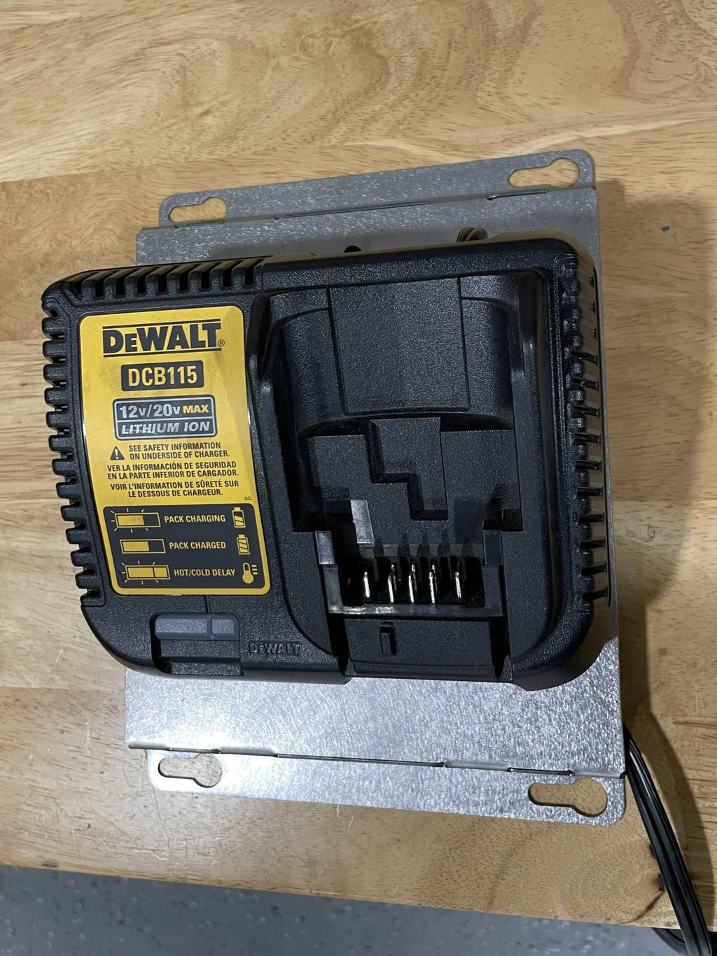Elevate Metalcraft charger wall mount plate for Milwaukee and DeWalt tools, designed for van, truck, or shop organization.