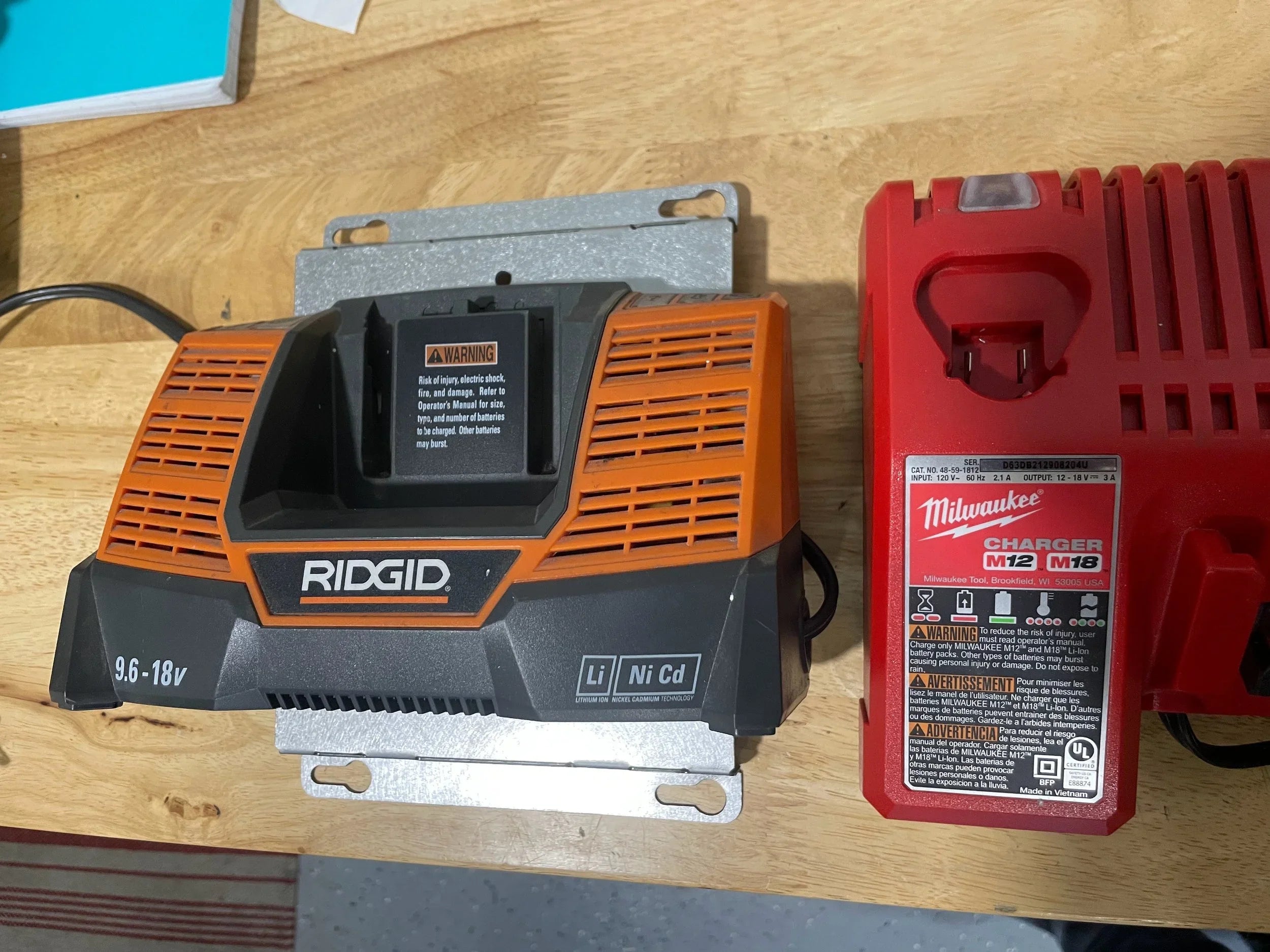 Elevate Metalcraft charger wall mount plate for Milwaukee and DeWalt tools, designed for van, truck, or shop organization.