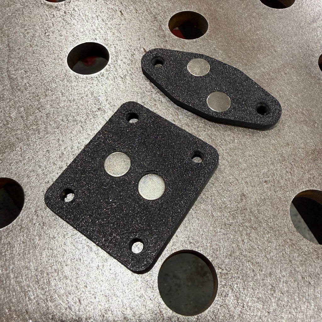 Elevate Metalcraft AMP Ball Magnetic Nut Plates with diamond-shaped design and two bolts for secure fastening.