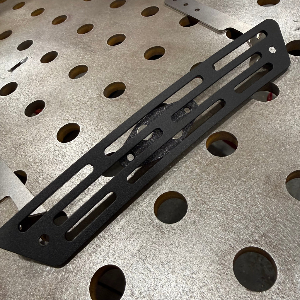 Elevate Metalcraft AMP Ball Magnetic Nut Plates with diamond shape and two bolt holes for secure fastening and easy installation.