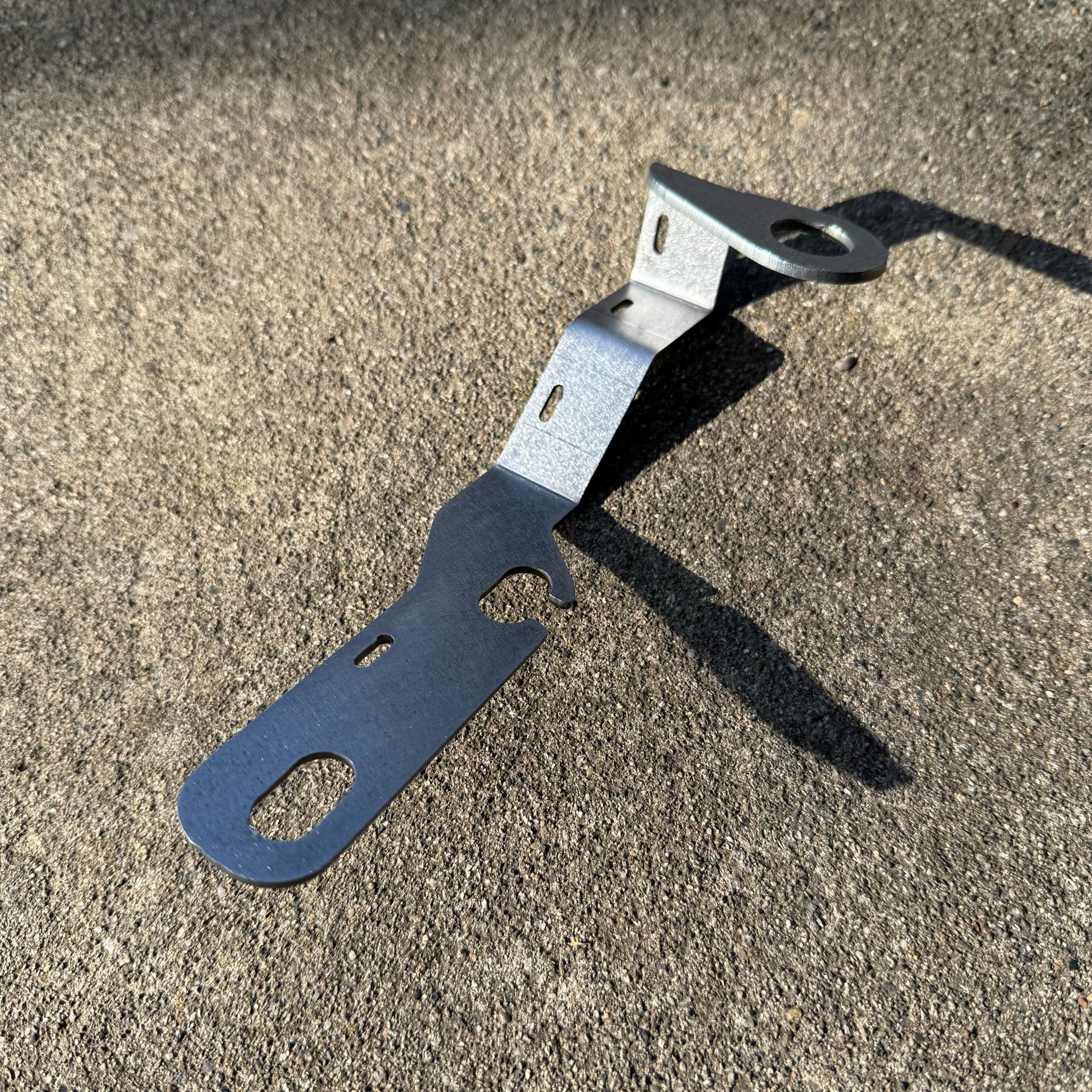 Elevate Metalcraft hood mount NMO ham radio antenna mount on driver side of 2003-2009 Toyota 4Runner hood, durable metal construction.