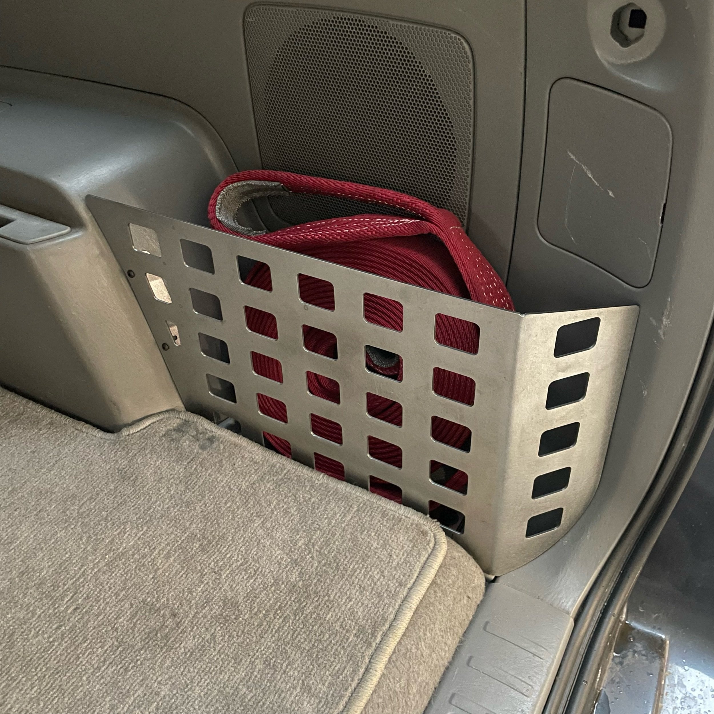 Toyota 4Runner 2003-2009 4th gen rear storage Molle panel by Elevate Metalcraft, mounted in vehicle interior.