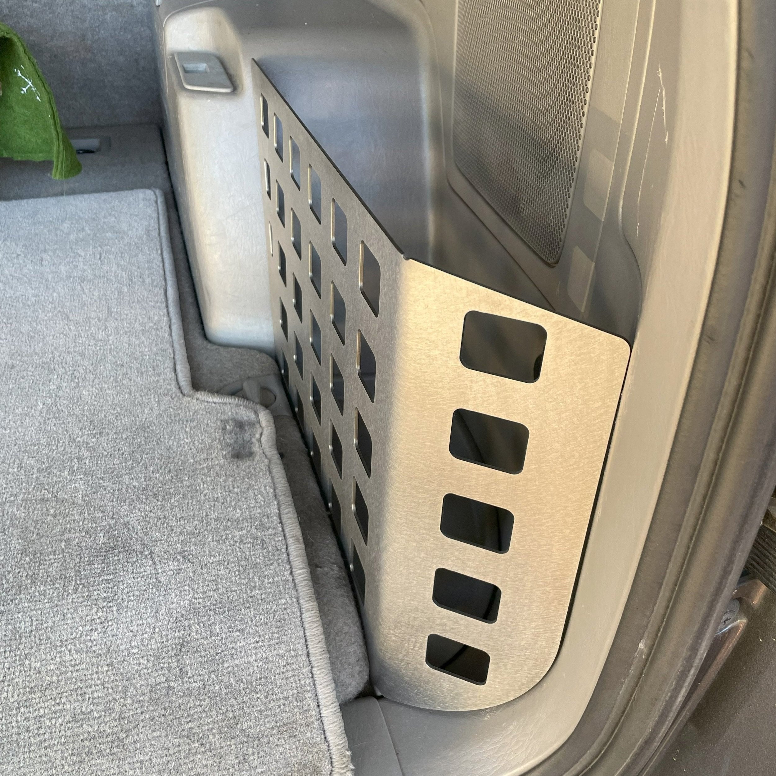 Toyota 4Runner 2003-2009 4th Gen rear storage pocket Molle panel by Elevate Metalcraft, mounted inside the vehicle's rear cargo area.