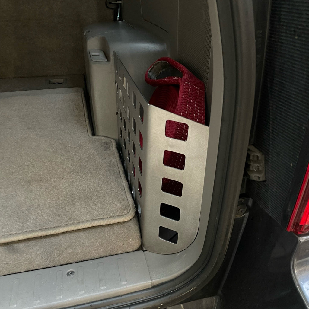 Toyota 4runner 4th Gen rear storage pocket Molle panel by Elevate Metalcraft, mounted inside the vehicle for organized storage.
