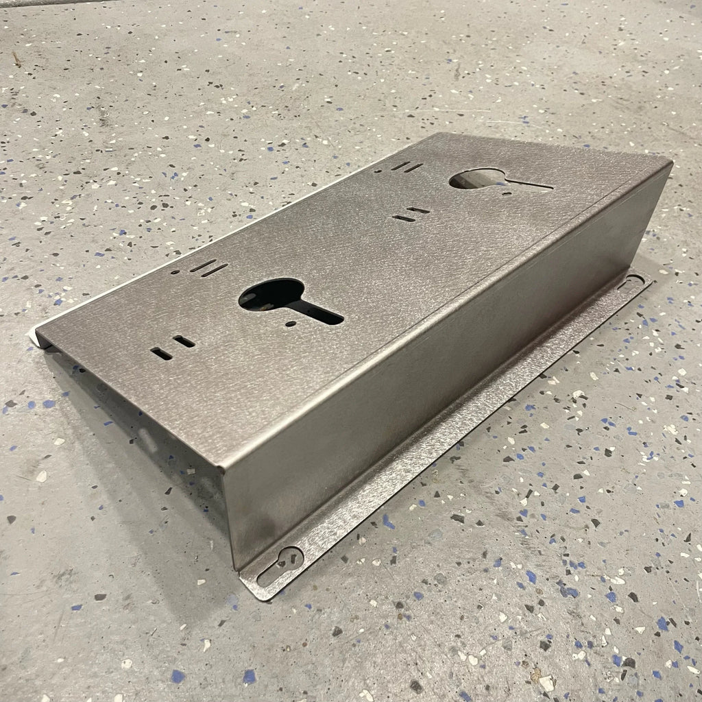 Elevate Metalcraft wall mount plate for Milwaukee M18 and M12 rapid battery chargers at a 20-degree angle, for van, truck, or shop use.