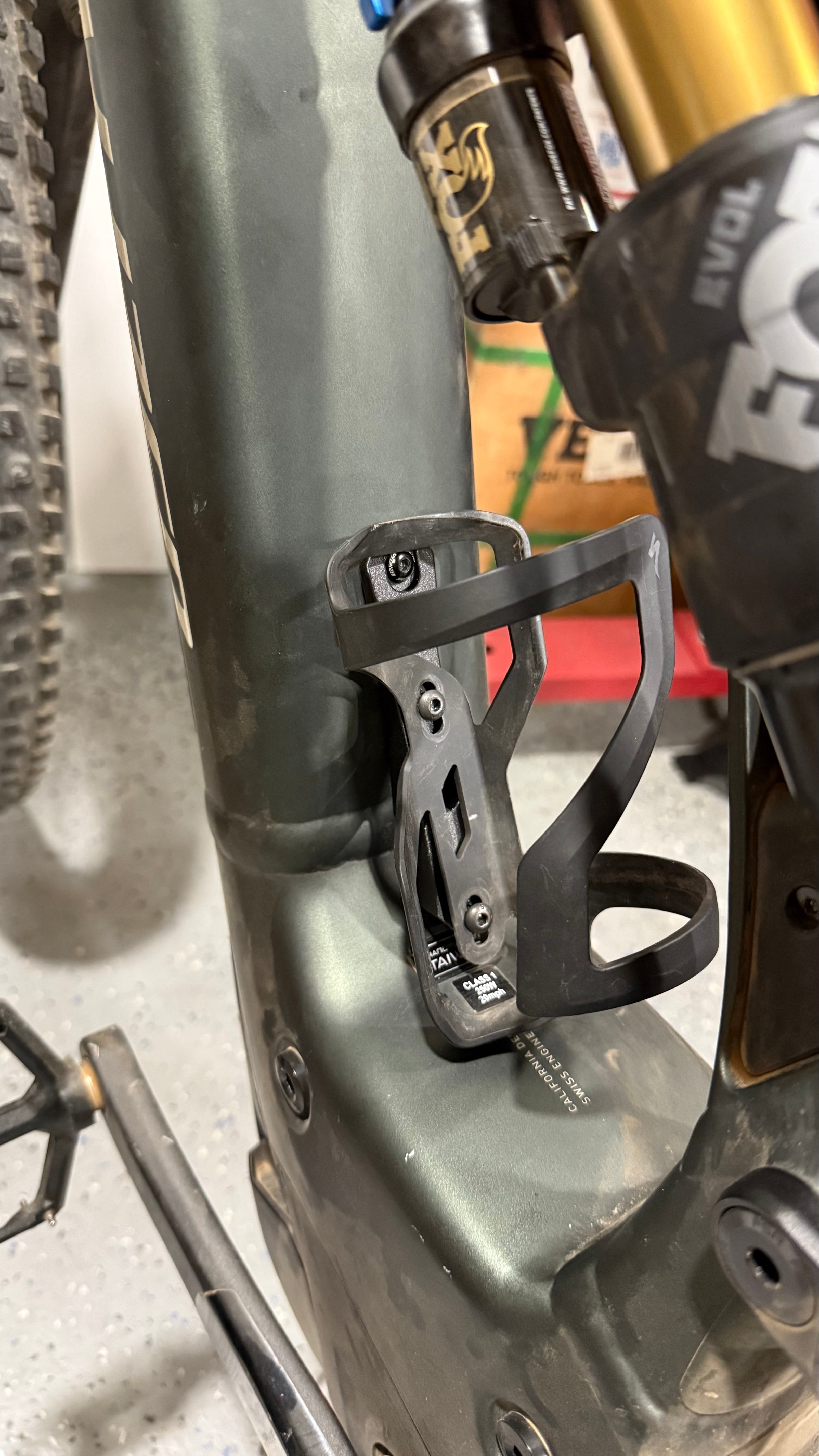 Black Elevate Metalcraft MTB water bottle cage relocation for Specialized Turbo Levo Gen2 electric mountain bike.