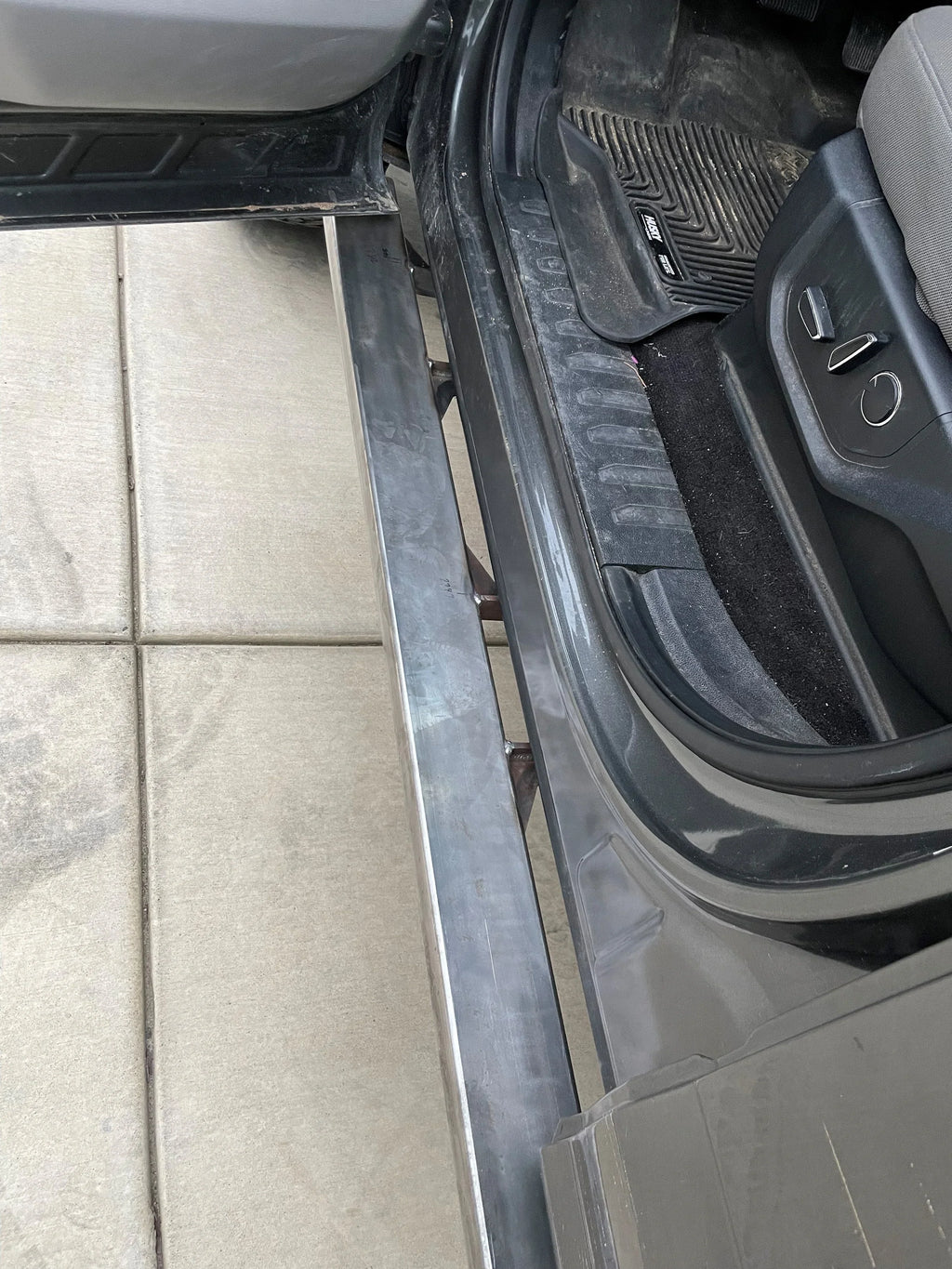 Elevate Metalcraft Raptor/Ford F-150 Rock Slider Steps for 2015-2020 SuperCrew 4-door pickup truck, side protection and style.