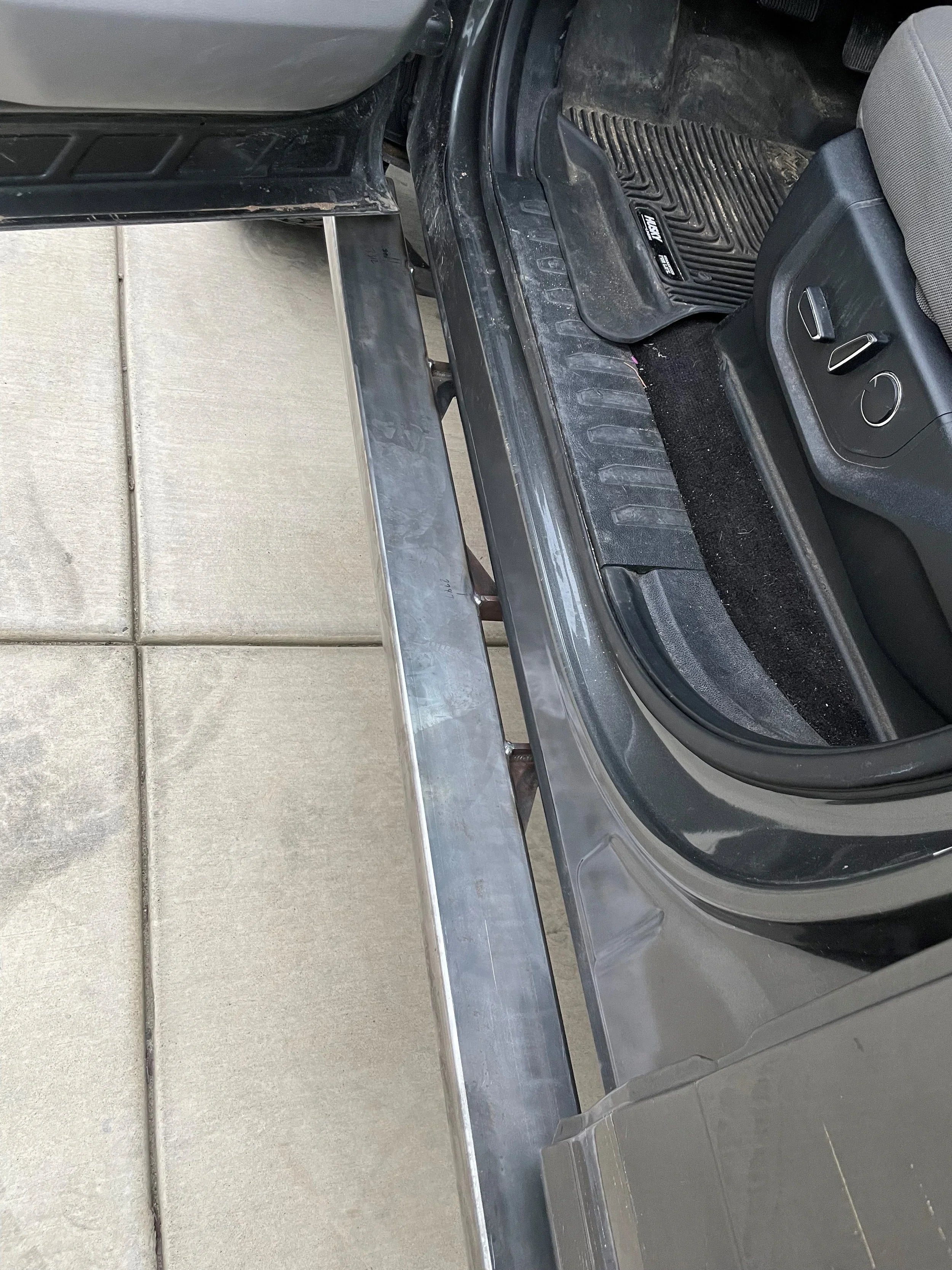 Elevate Metalcraft Raptor/Ford F-150 Rock Slider Steps for 2015-2020 SuperCrew 4-door pickup truck, side protection and style.