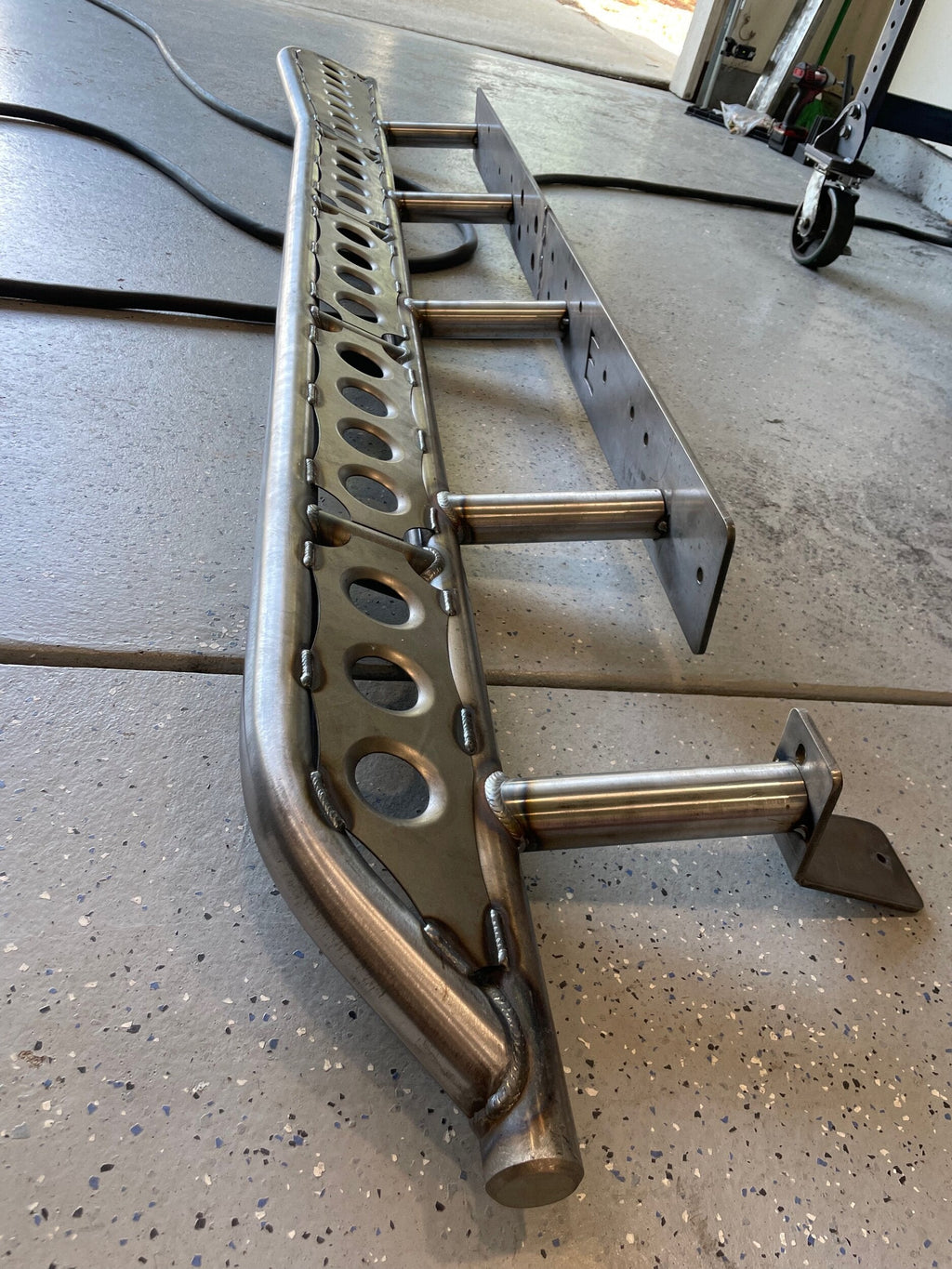 Toyota Tacoma longbed rock sliders frame plate kit by Elevate Metalcraft, featuring bolt-on installation for enhanced side protection.