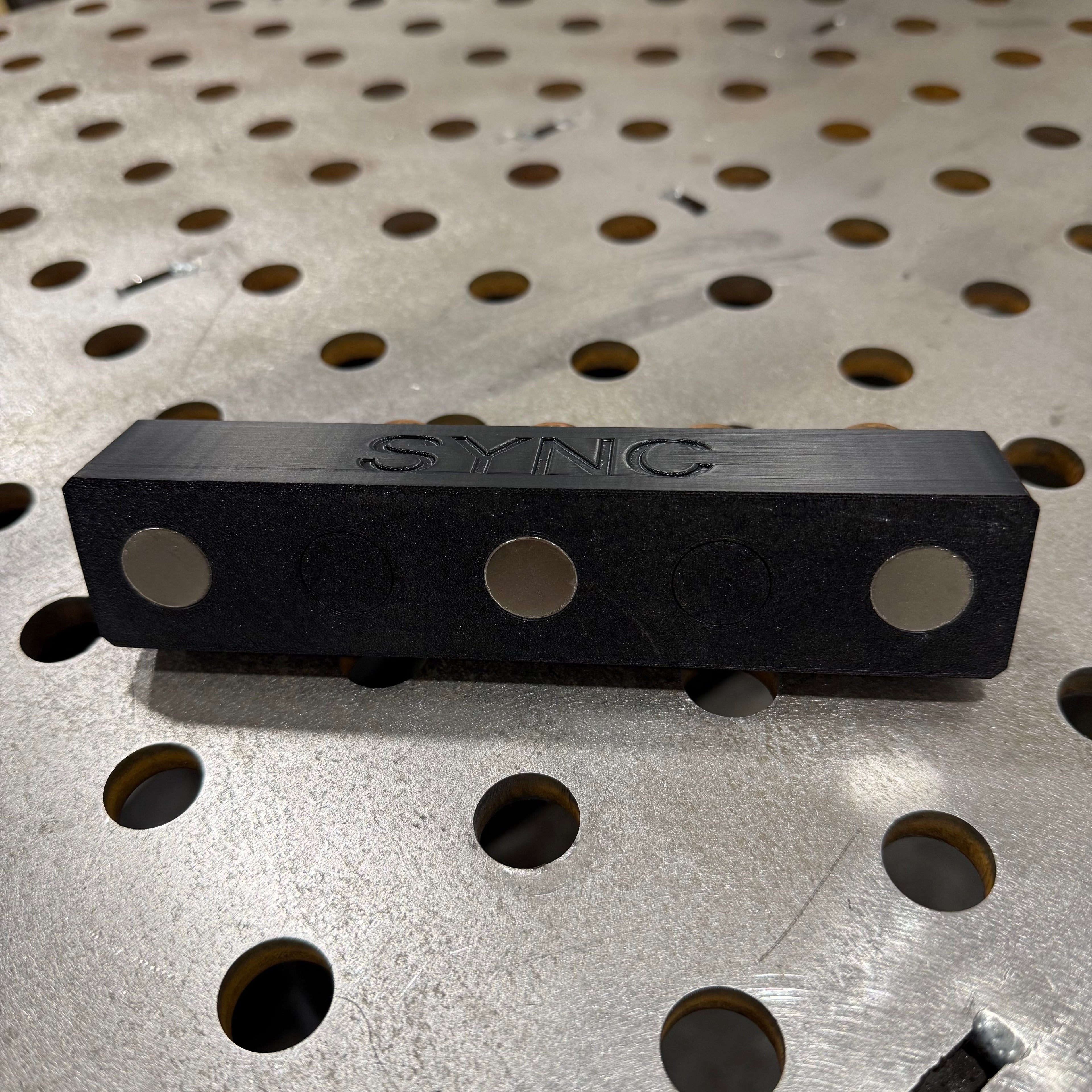 Elevate Metalcraft Sync Plasma Cartridge Organizer with magnetic CNC holder for Hypertherm Sync plasma cartridges.