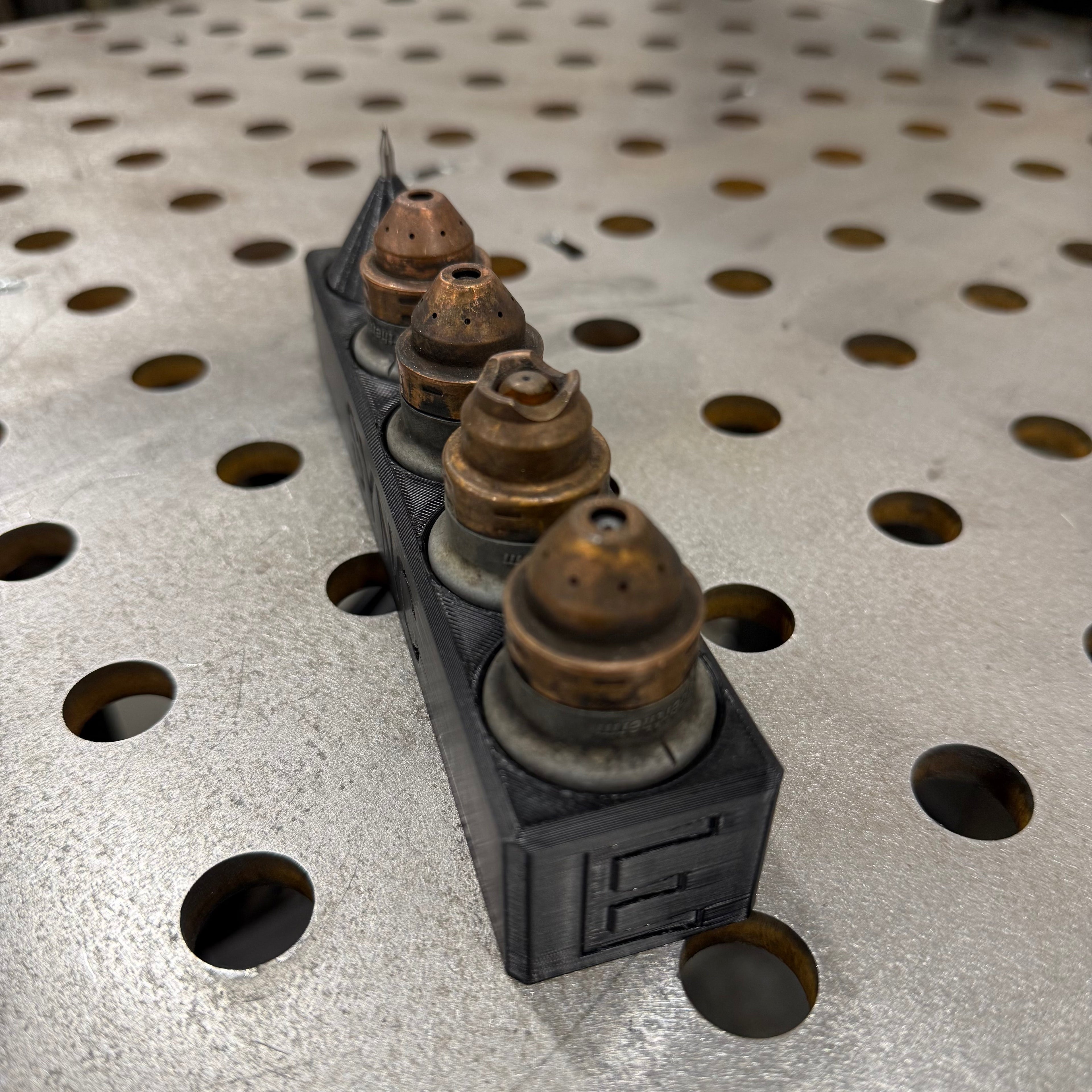 Elevate Metalcraft Hypertherm Sync Plasma Cartridge Organizer with magnetic CNC-compatible design and multiple slots for tools.