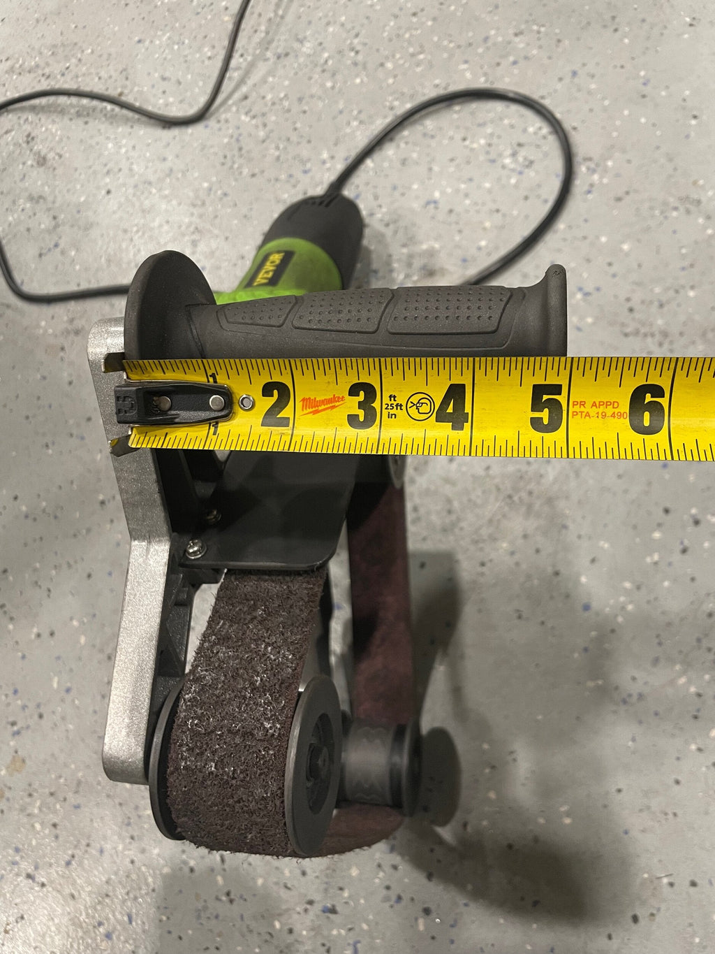 Wall mount for tube polisher by Elevate Metalcraft, sturdy metal bracket designed for secure installation of tube polishing equipment.