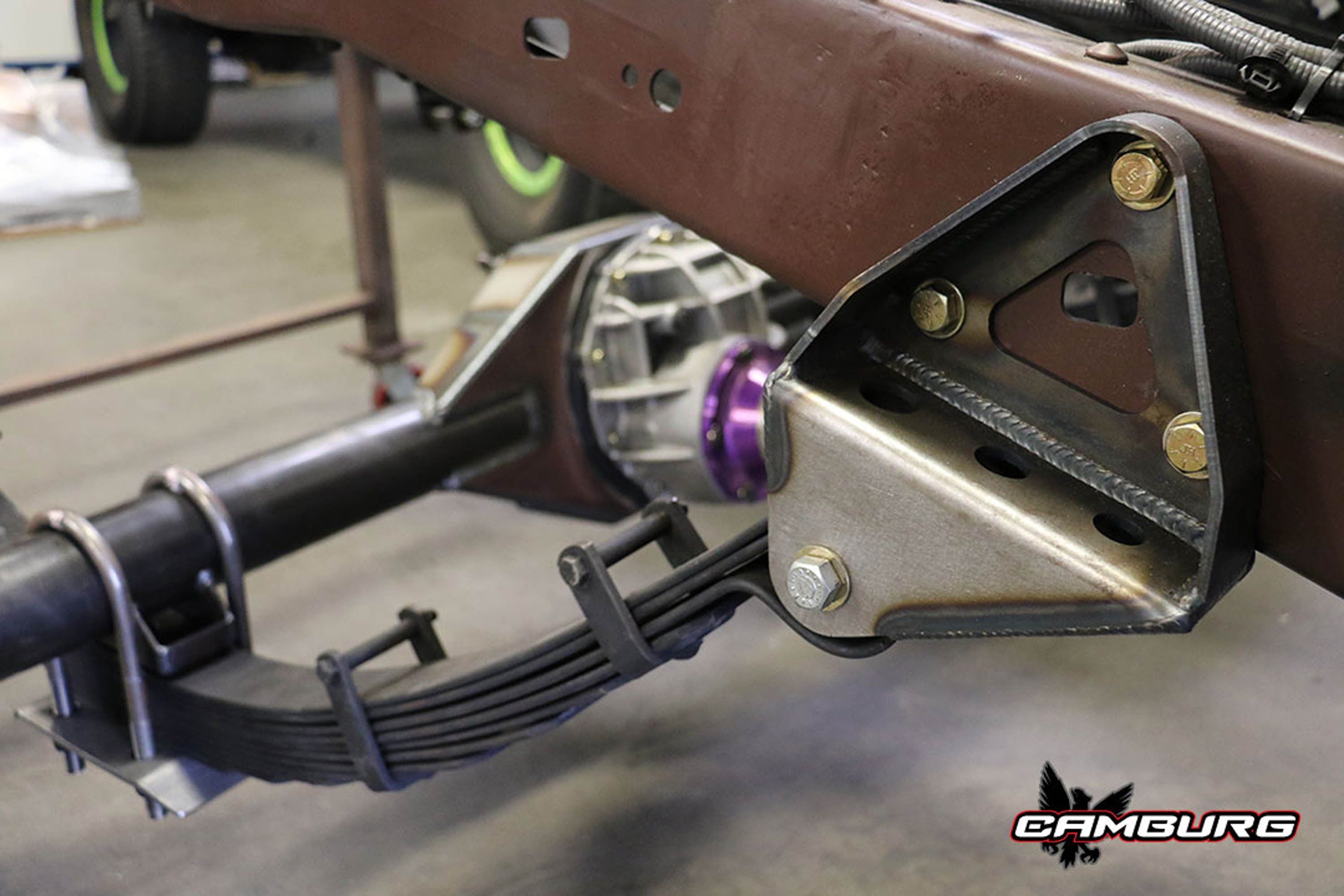 FR SPORT Camburg Toyota Tacoma 05-23 leaf spring shackle kit with under-mounts, shackles, and hardware, for suspension upgrade.