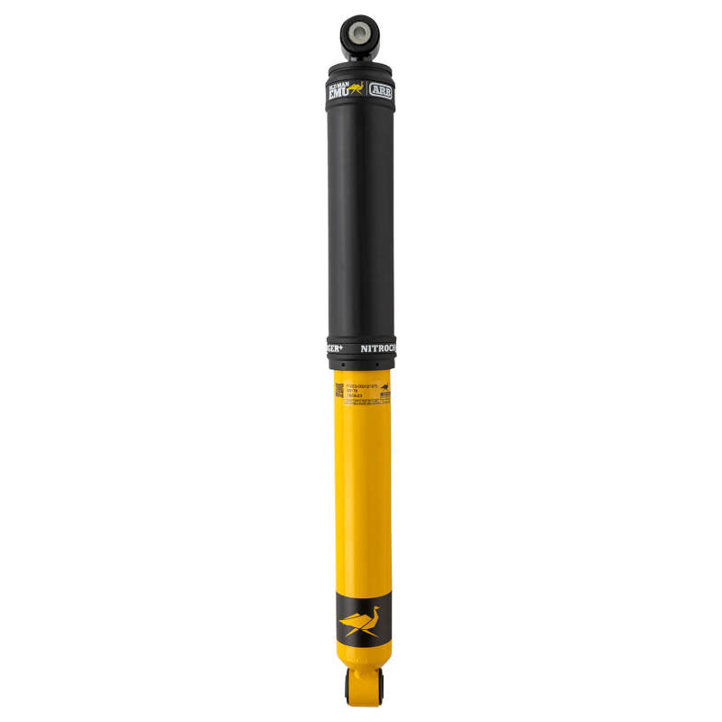Rear Old Man Emu ARB OME Nitrocharger Plus twin tube shock absorber for off-road vehicles, with visible hydraulic components.