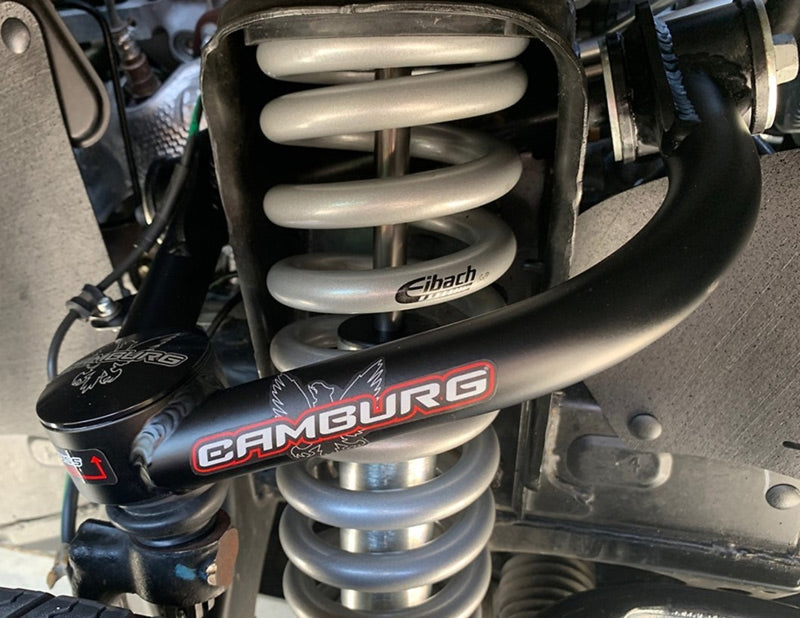 FR SPORT Camburg Toyota Tacoma Pre/4WD 05-23 suspension control arm kit with X-Joint upper arms, shown installed on truck.