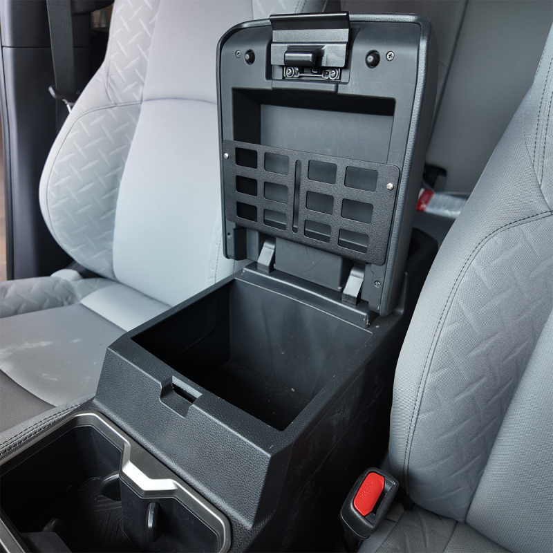 Cali Raised LED interior center console Molle panel for 2024 Toyota Tacoma, vehicle organizer by FR SPORT, installed in the vehicle interior.