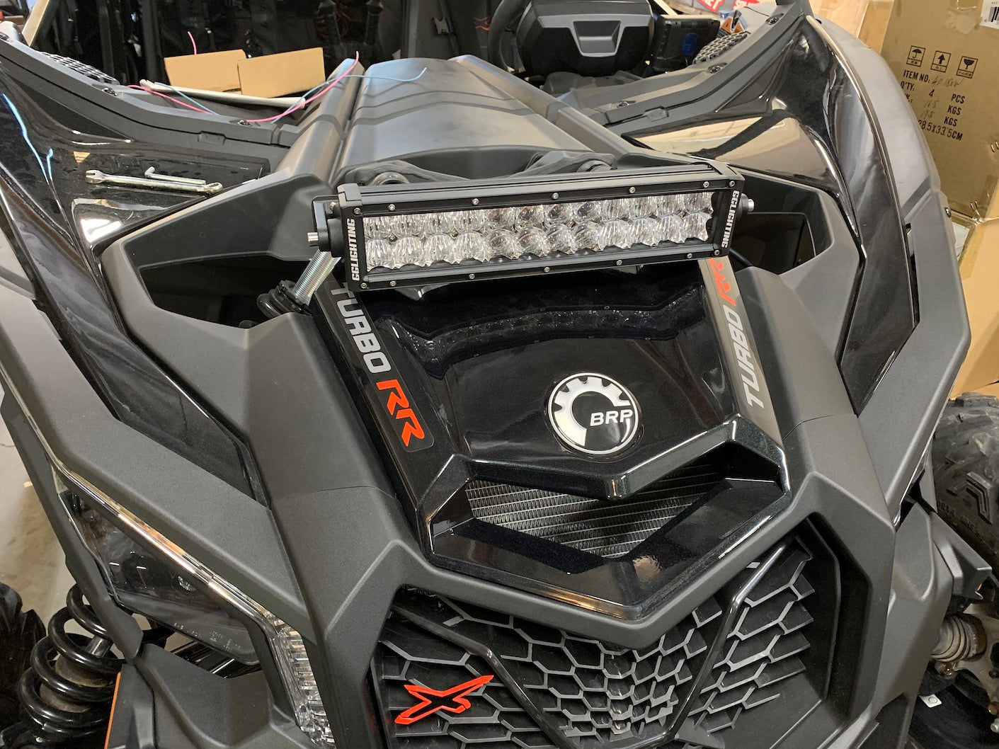GGLighting universal shock tower bracket for Can-Am X3, designed for LED pods or LED light bars, made in the USA.
