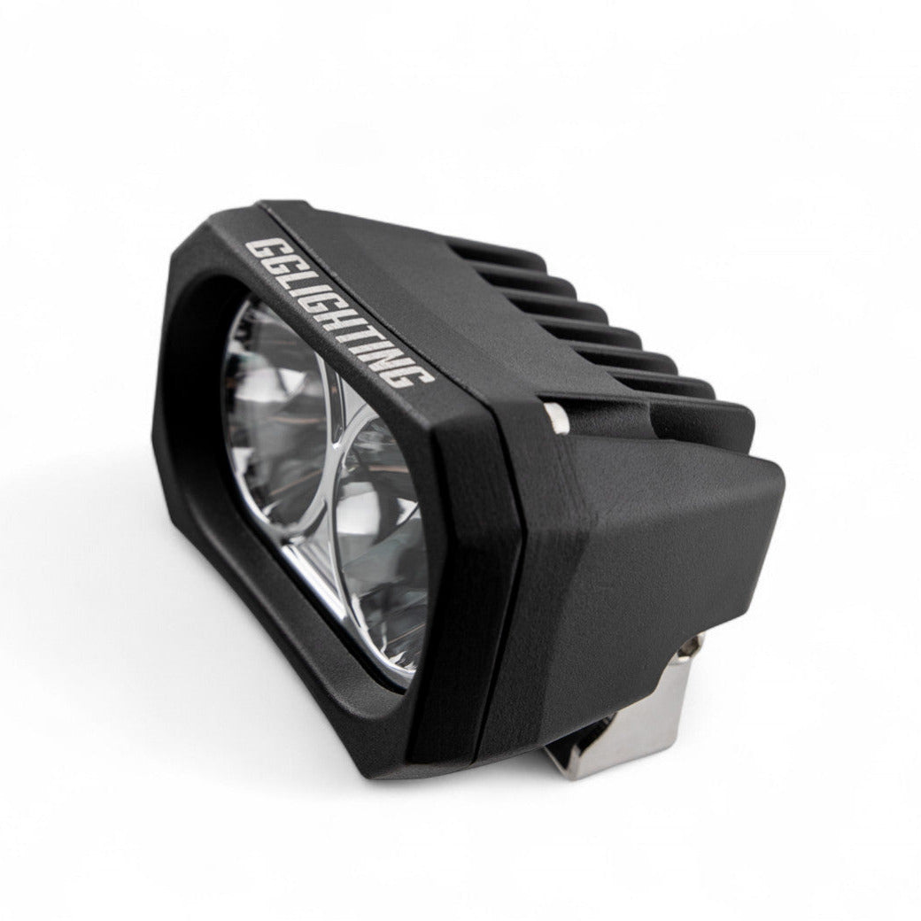 Pair of GGLighting GP20 LED Pods with no wiring harness, black housing, mounted on a vehicle for off-road or auxiliary lighting.