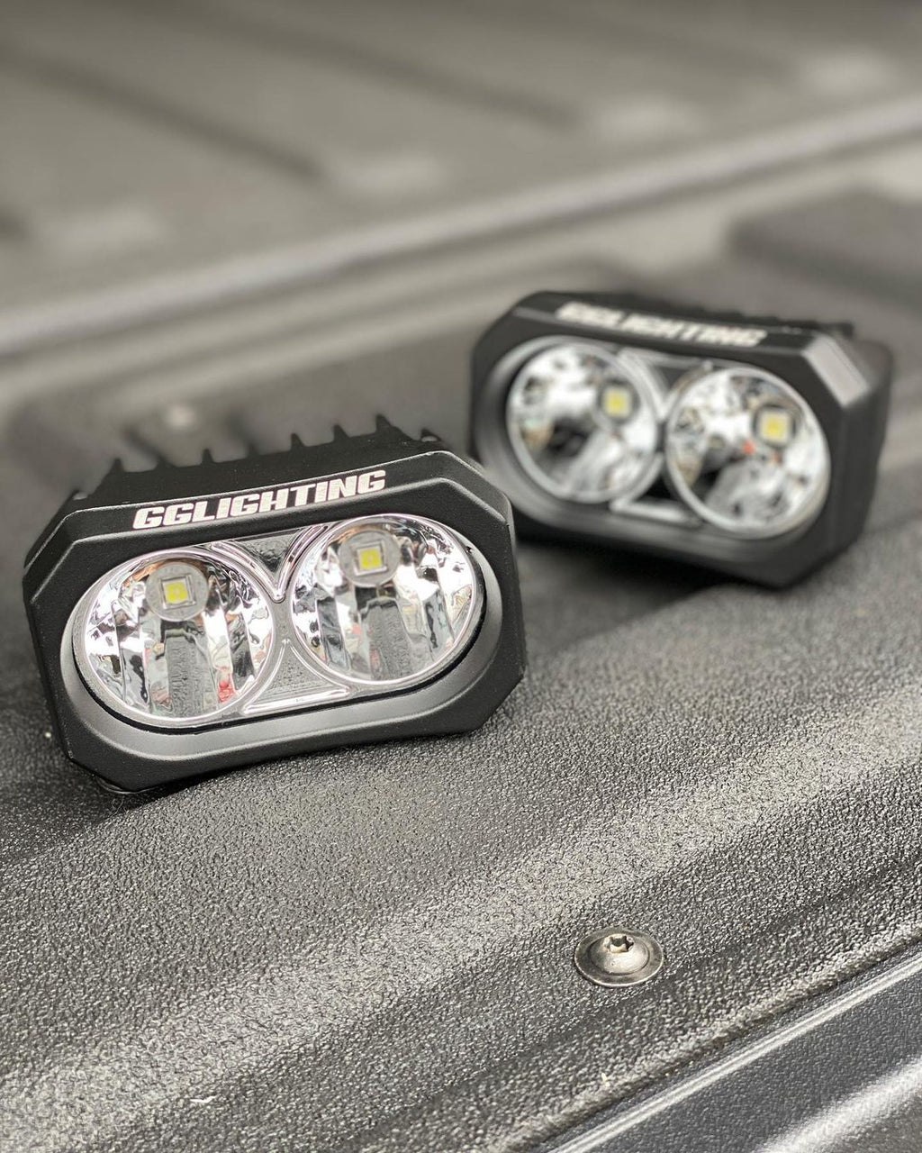 Pair of GP20 LED pods from GGLighting with no wiring harness, designed for off-road or automotive lighting applications.