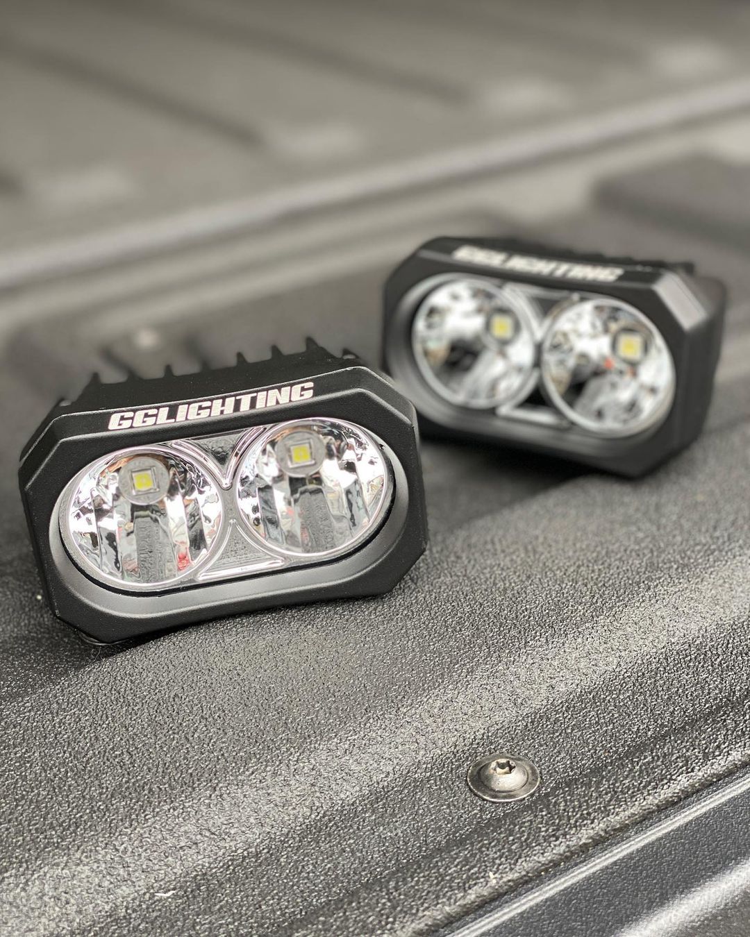 Pair of GP20 LED pods from GGLighting with no wiring harness, designed for off-road or automotive lighting applications.