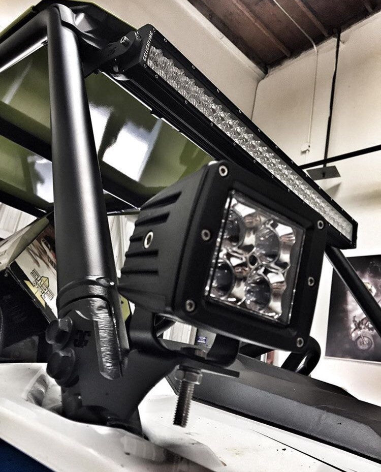 GGLighting Polaris RZR 1000 and 2014+ RZR 900 30-inch LED light bar roof mounts on vehicle roof.