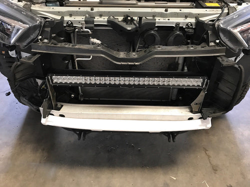 GGLighting Toyota 4Runner 2009+ behind the grill 30-inch LED light bar mounts mounted on vehicle front grille.