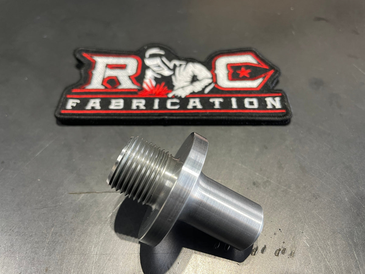 RC Fabrication offroad shock rod end shifter part, close-up of the metal rod end component for vehicle suspension.