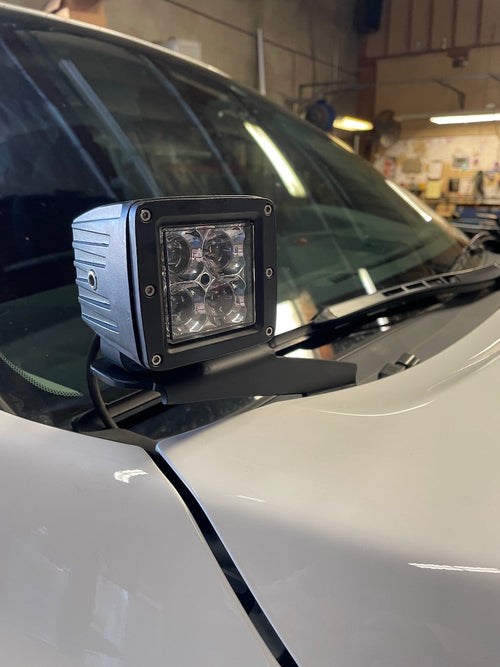 GGLighting Toyota Tundra pillar ditch light pod mounts installed on a 2007+ model, showing metal brackets and mounting points.