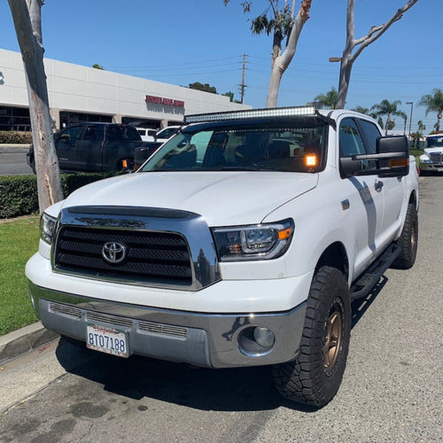 GGLighting 2007+ Toyota Tundra roof mount with 50-inch curved LED light bar for vehicle lighting and off-road use.