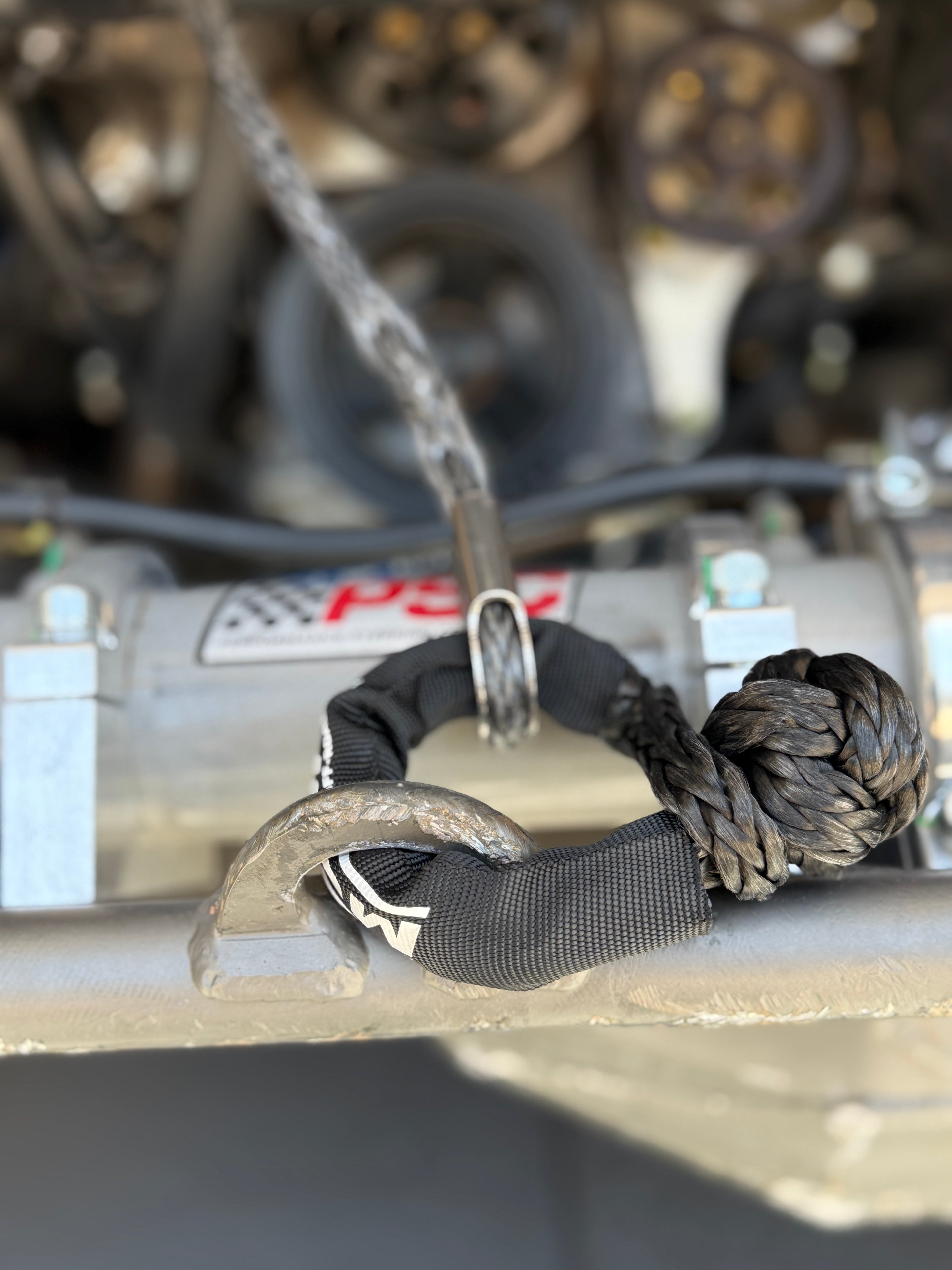 Black MOJAB OFFROAD soft shackle in 3/8 inch by 14 inch size with sleeve and bag for off-road recovery.