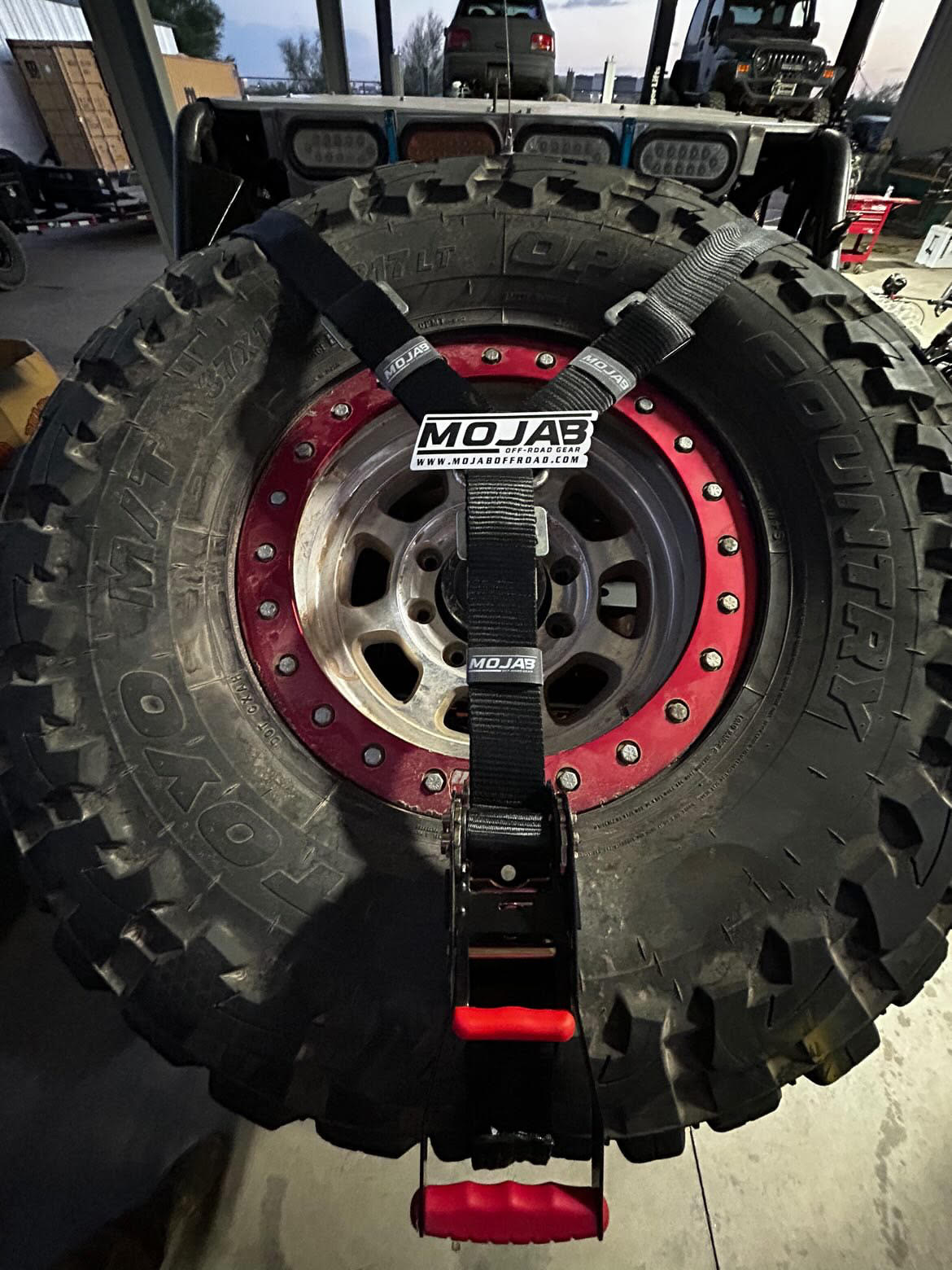 MOJAB OFFROAD 2" x 10' ratchet tie-down with closed hook and 2" x 39" axle tie-down set of four for secure vehicle transport.