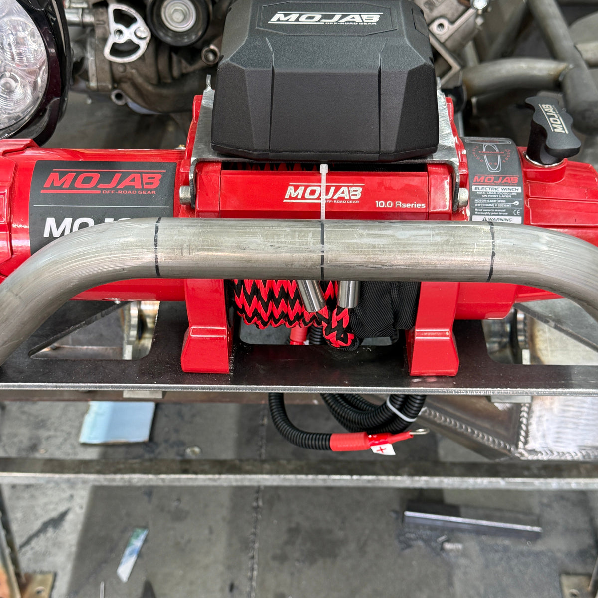 MOJAB OFFROAD MOJAB MO10.0 R-Series 10,000 lb electric off-road winch with rugged design and durable construction.