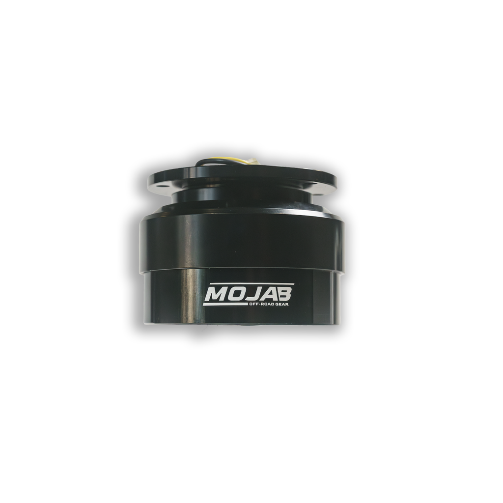 MOJAB OFFROAD quick release steering wheel hub shown with mounted steering wheel and secure locking mechanism.