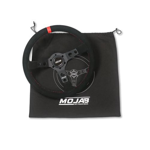 13.5-inch MOJAB OFFROAD deep dish steering wheel in black leather or suede with ergonomic design.