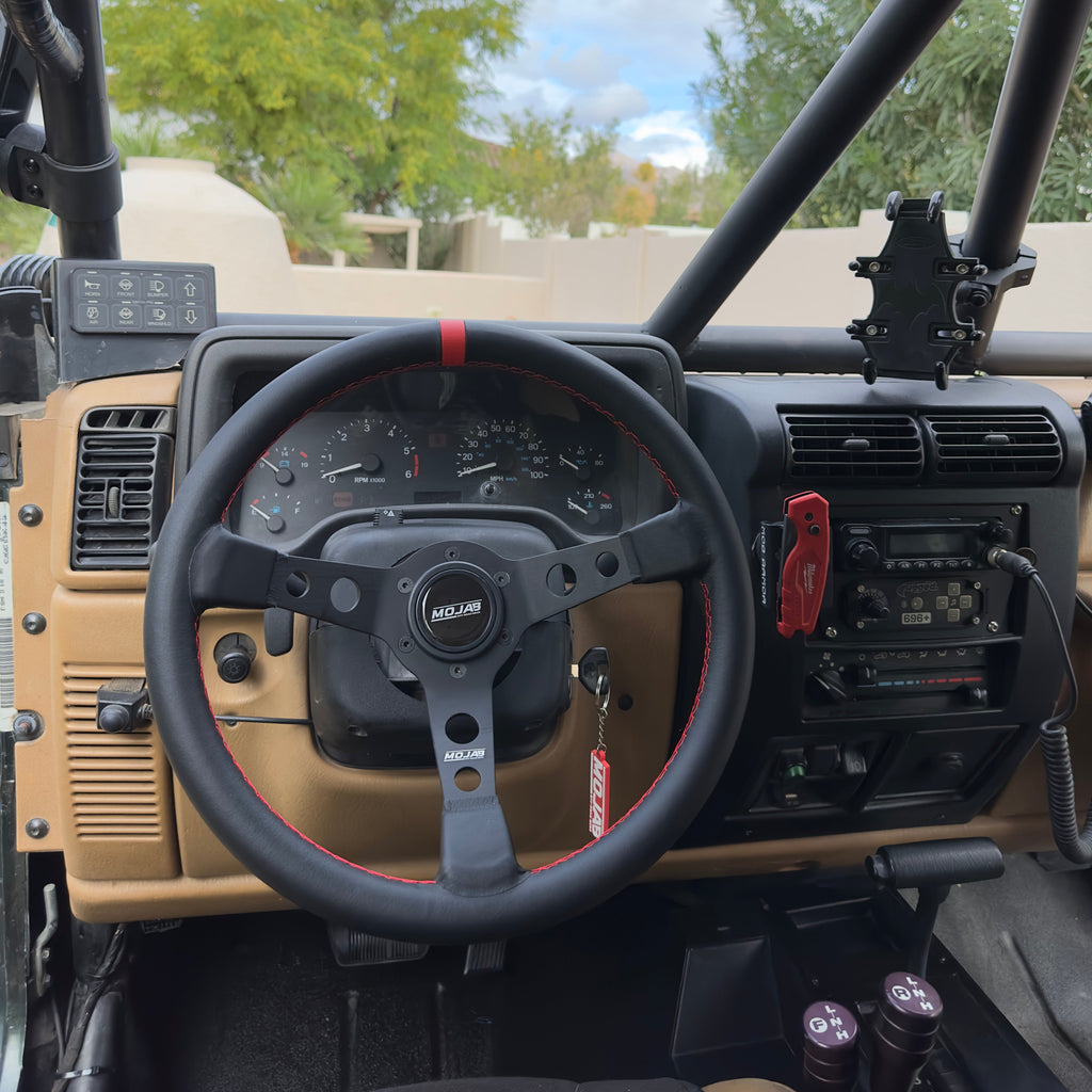13.5-inch MOJAB OFFROAD deep dish steering wheel with leather or suede cover, showcasing the luxurious textured surface.