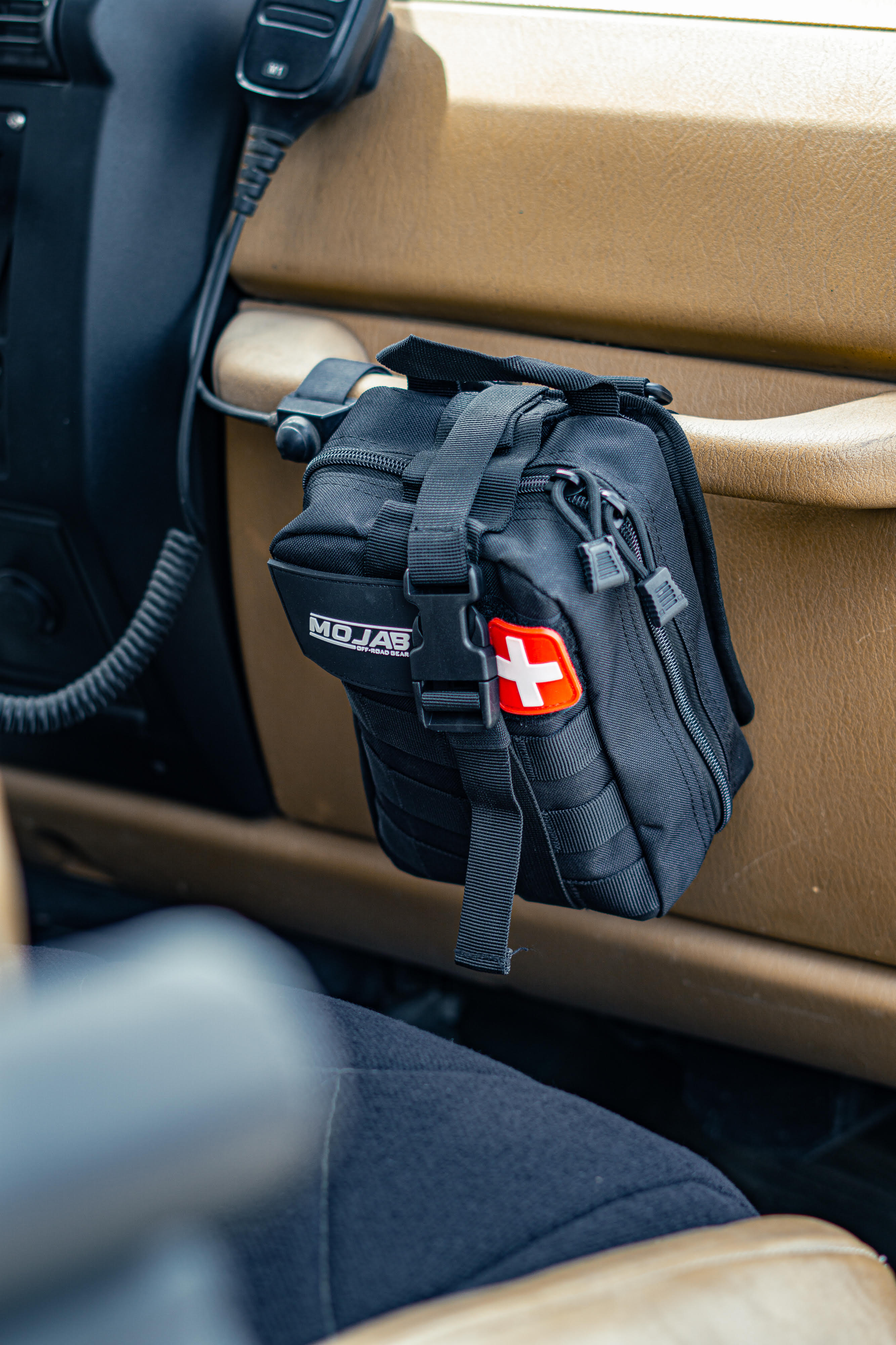 MOJAB OFFROAD recovery kit with 151 pieces, red first aid kit for emergency medical supplies and first aid needs.