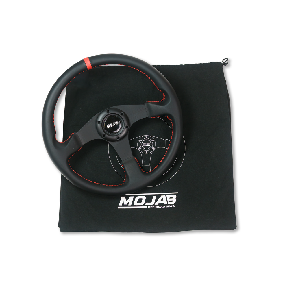 13.5-inch MOJAB OFFROAD flat steering wheel with leather or suede cover, showcasing a sleek, durable design for off-road vehicles.