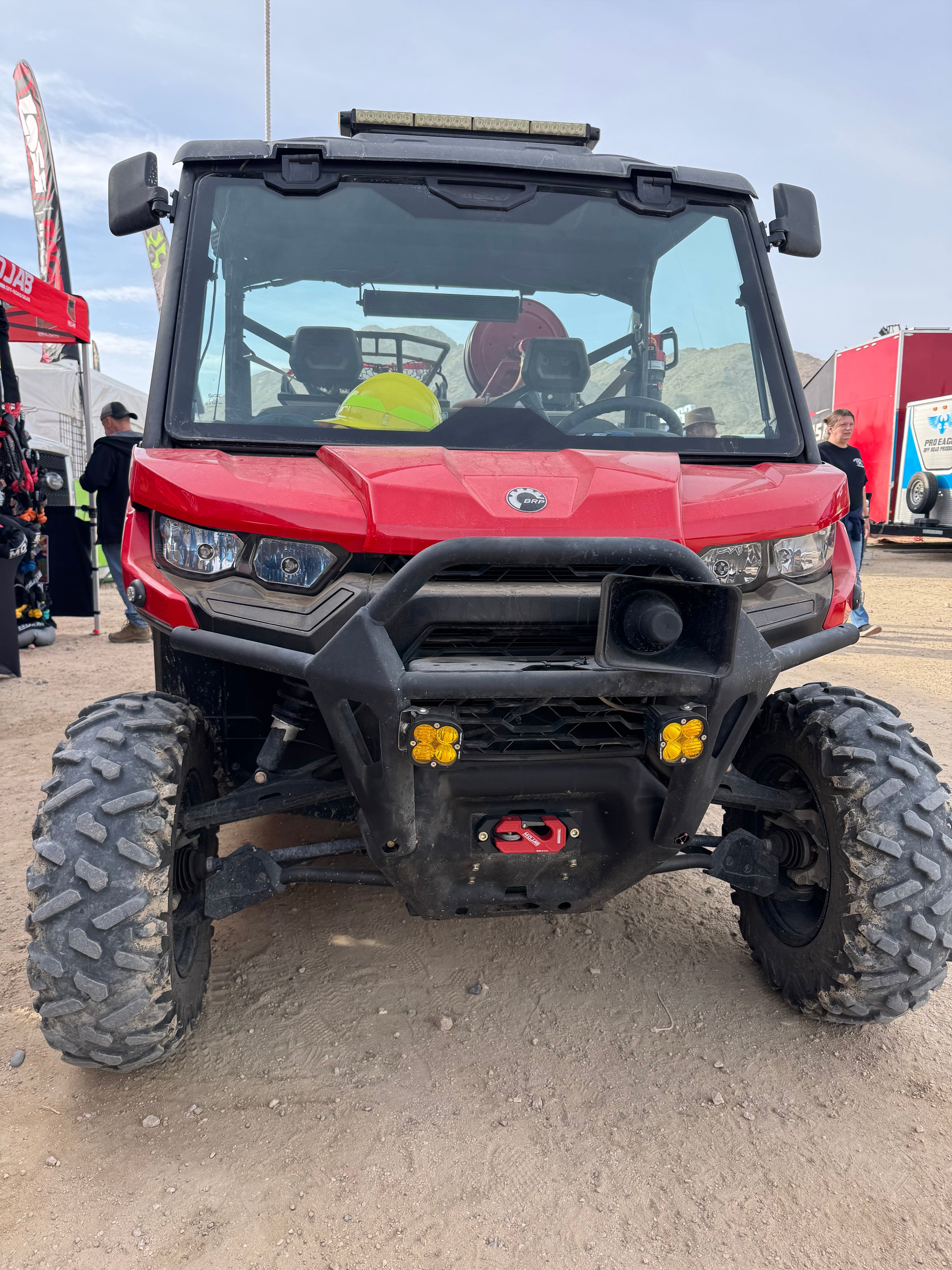 Red aluminum winch shackle with fairlead kit for side-by-side UTVs, from MOJAB OFFROAD, featuring recessed design and lifetime warranty.