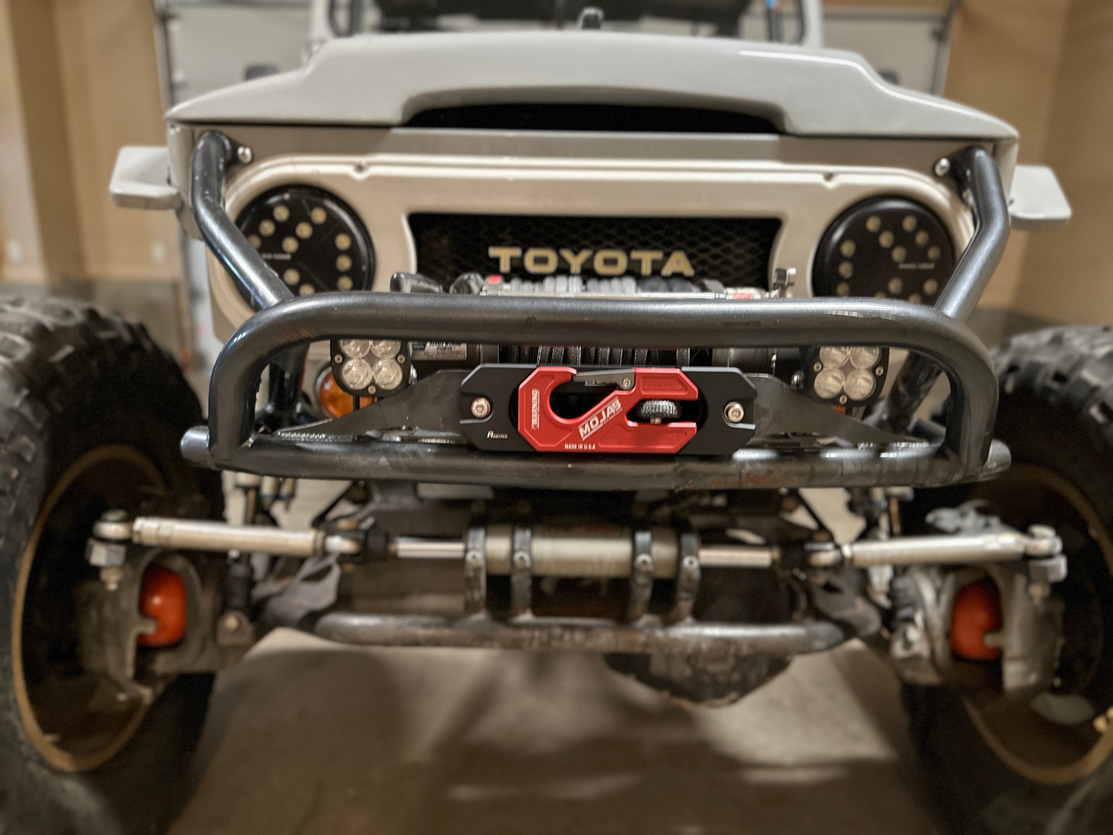 Yellow aluminum recessed winch shackle with fairlead kit by MOJAB OFFROAD, designed for durable off-road winching setups.