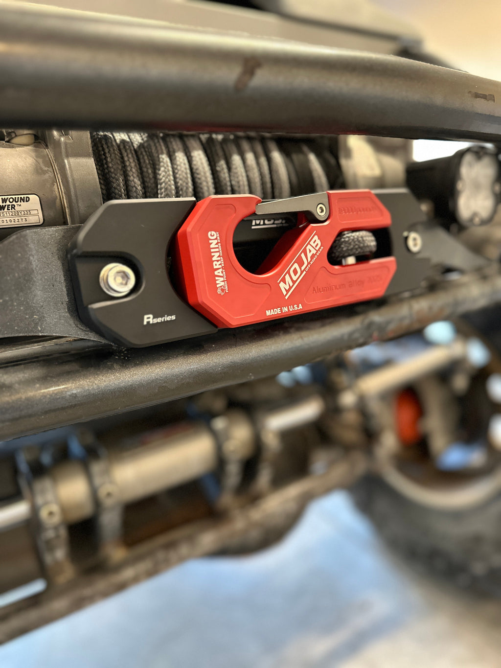 Yellow aluminum recessed winch shackle with fairlead kit from MOJAB OFFROAD, designed for durable off-road winching.