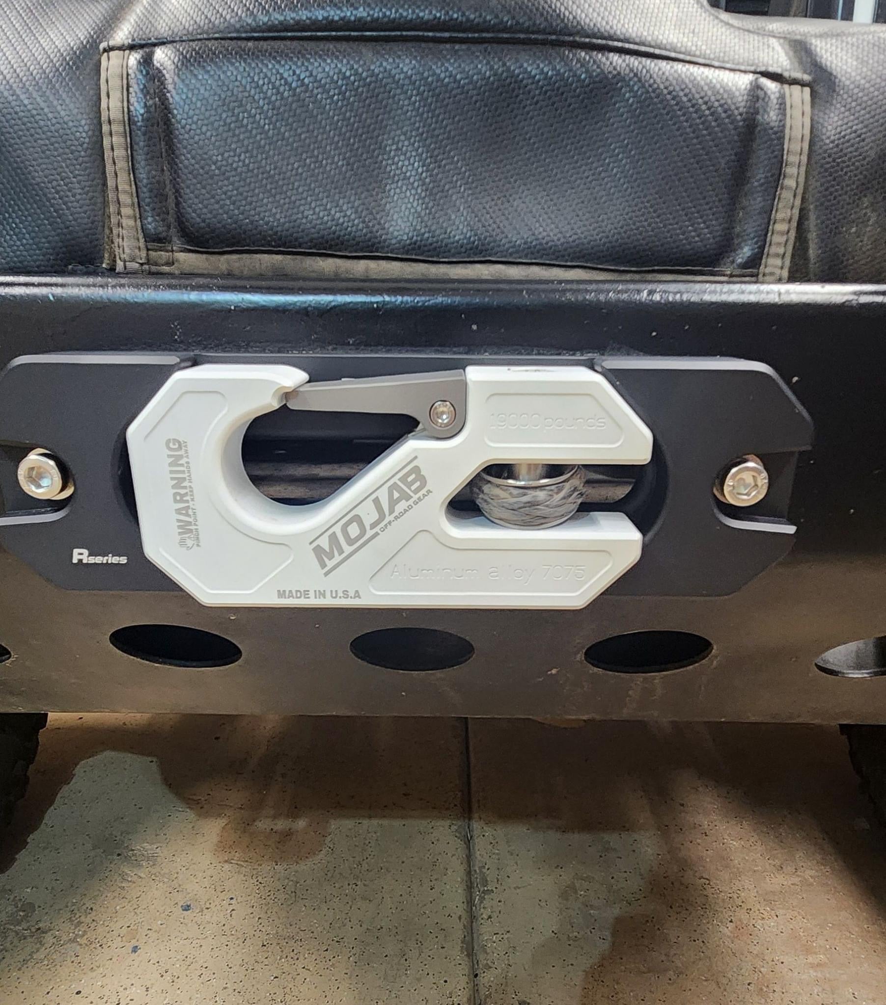 Yellow aluminum recessed winch shackle with fairlead kit from MOJAB OFFROAD, designed for heavy-duty off-road recovery.