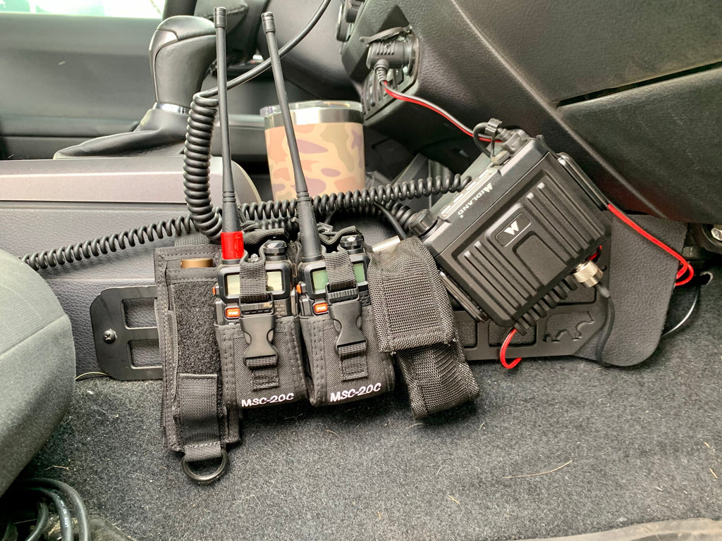 2nd/3rd Gen Toyota Tacoma center console Molle panel set by New Holland Overland, designed for organized storage and gear attachment.