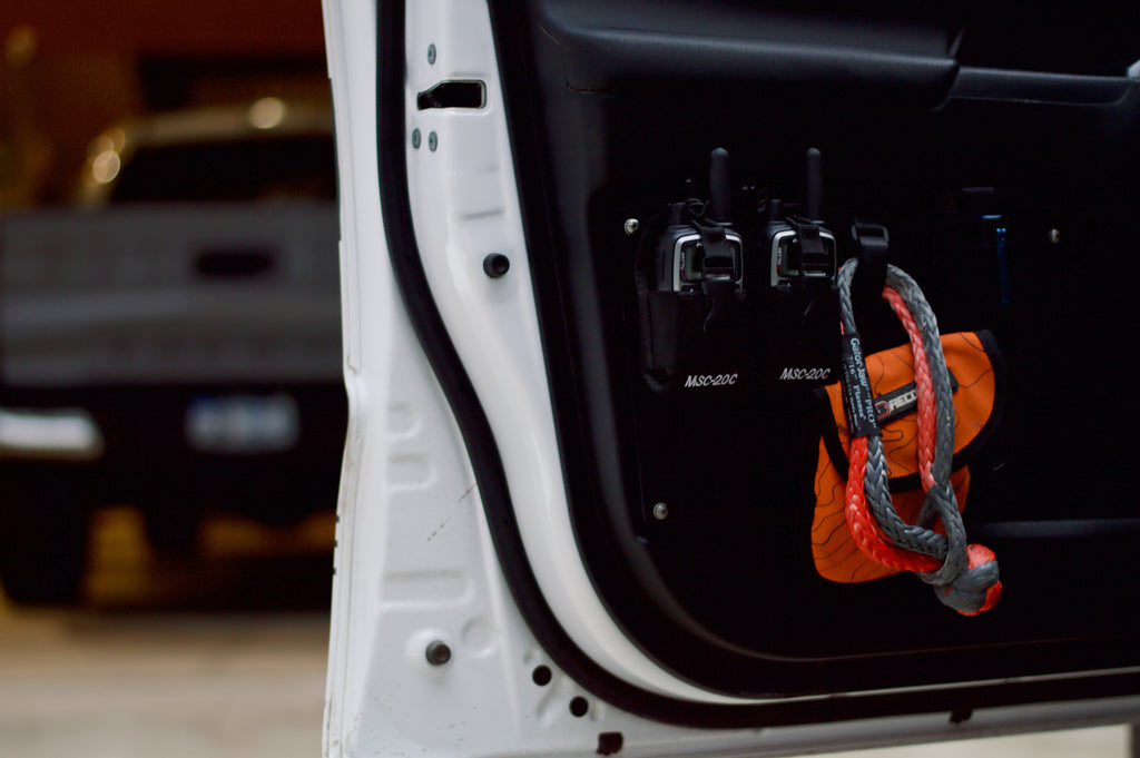 3rd Gen Tacoma door Molle panel set by New Holland Overland, mounted on vehicle door with rugged metal design.