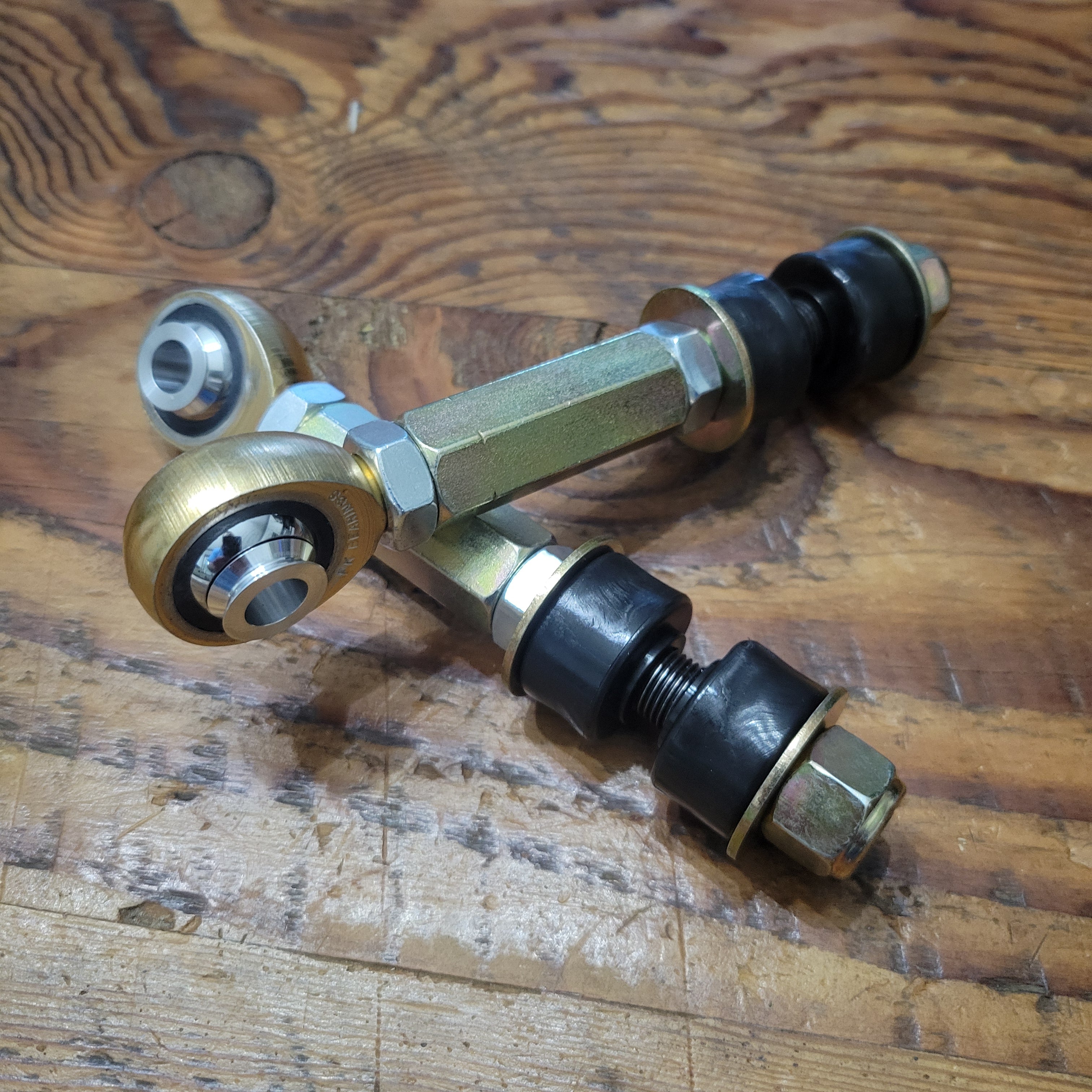 Overland Custom Design Land Cruiser sway bar links for 100 Series front suspension, durable automotive off-road upgrade