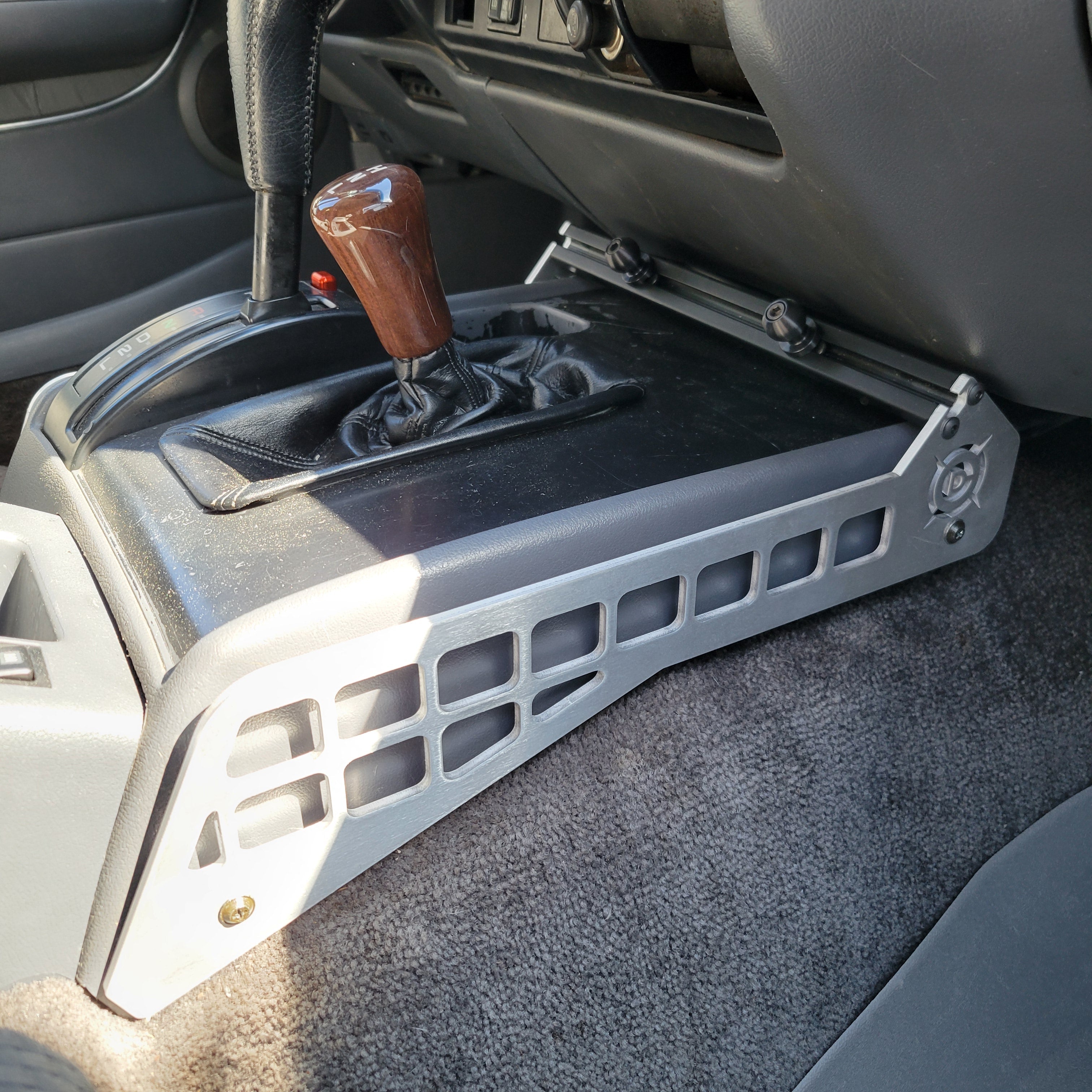 Overland Custom Design 80 Series Center Console Mount for 1991-1994 Toyota Land Cruiser, showcasing durable vehicle interior accessory