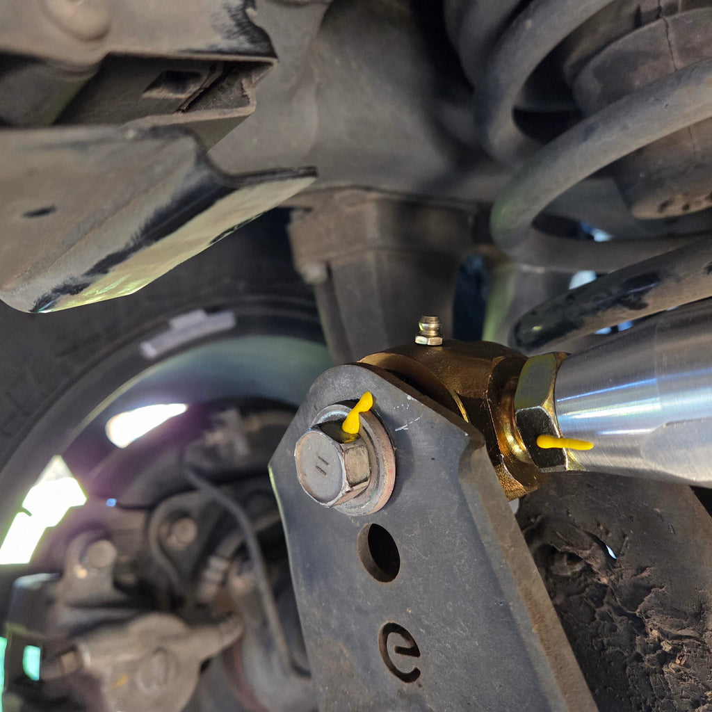 Overland Custom Design Panhard Bar for 96+ Toyota 4Runner, FJ Cruiser, and GX models, visible in black with mounting hardware