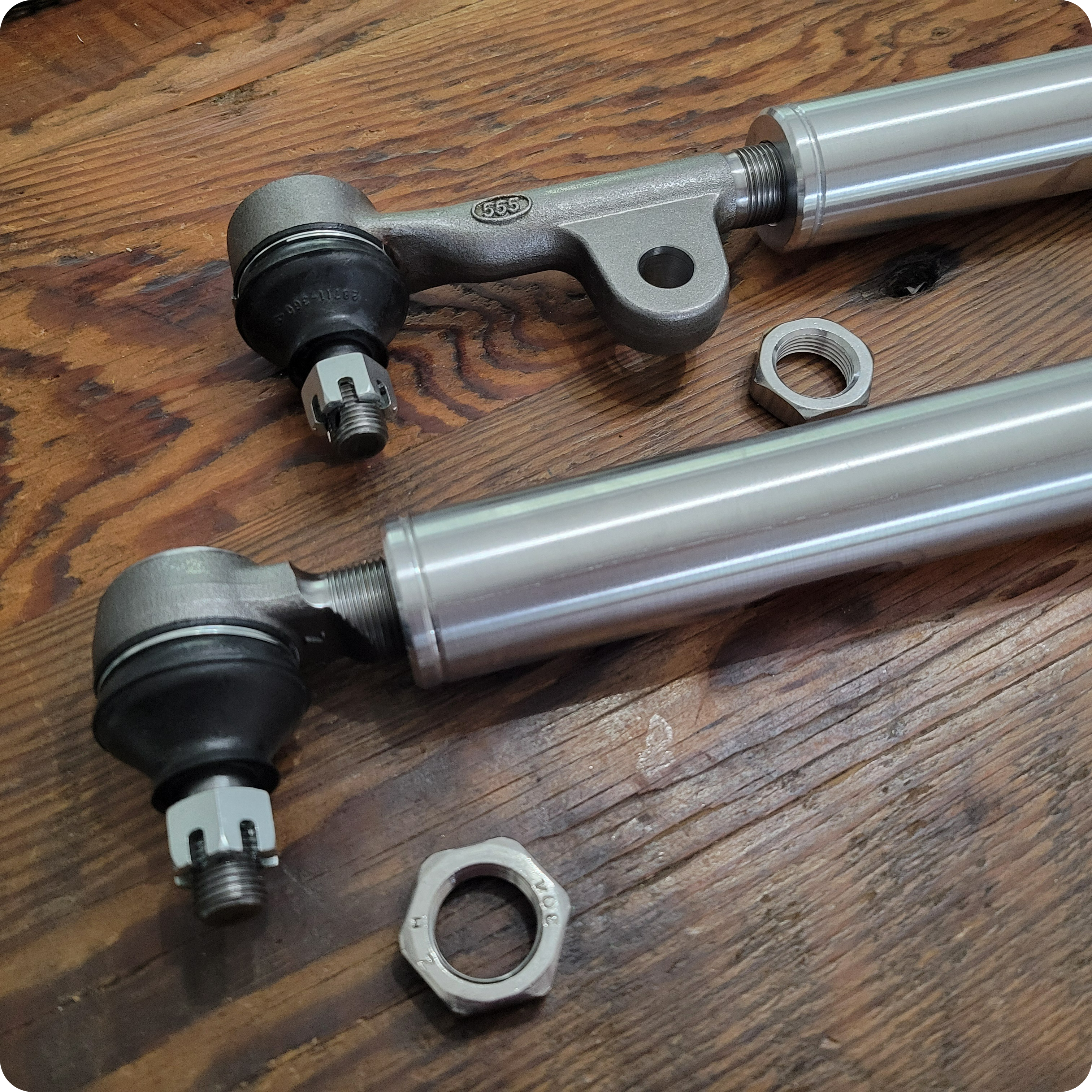 Overland Custom Design 80 Series Steering Linkage for Toyota Land Cruiser, durable metal components with mounting points visible