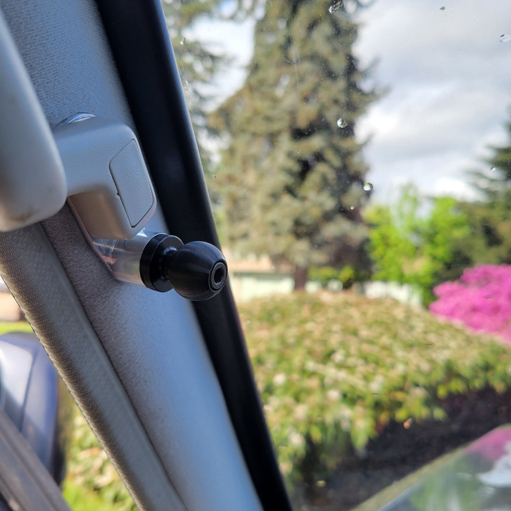 Overland Custom Design A-Pillar grab handle mount installed on vehicle interior for secure handhold and support.