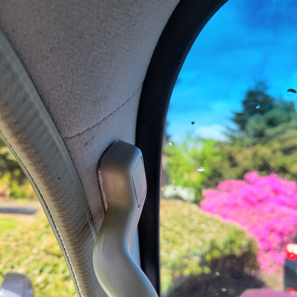 Overland Custom Design A-Pillar Grab Handle Mount installed on vehicle interior for secure handhold and support
