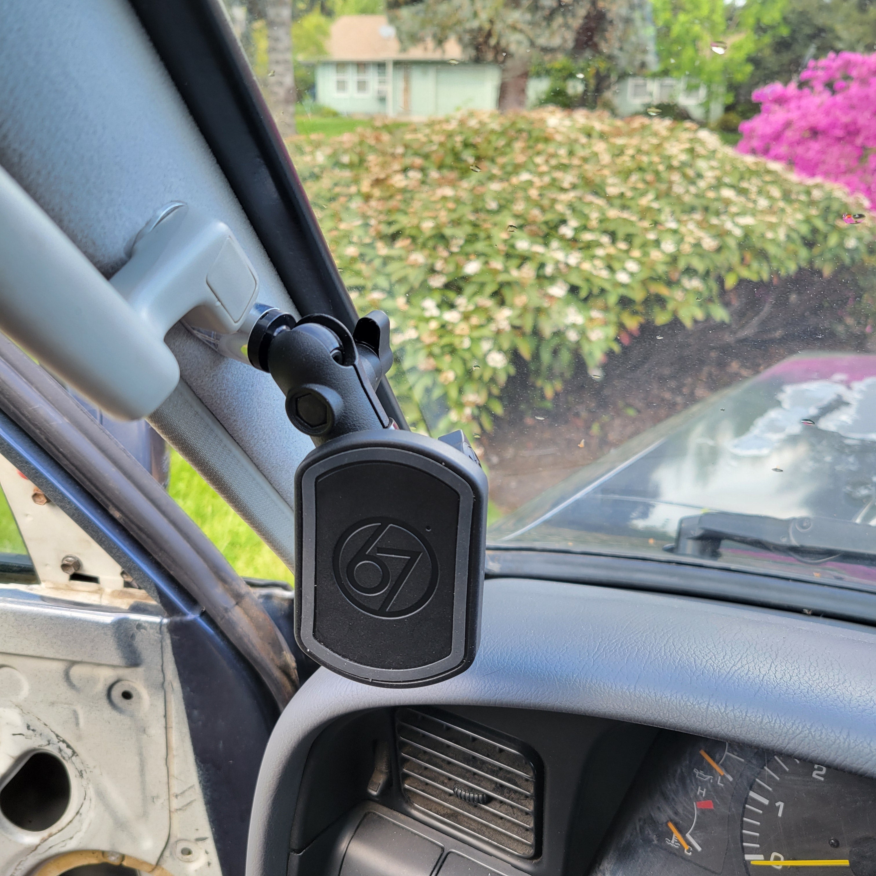 Overland Custom Design A-Pillar Grab Handle Mount installed on vehicle interior for improved grip and safety.